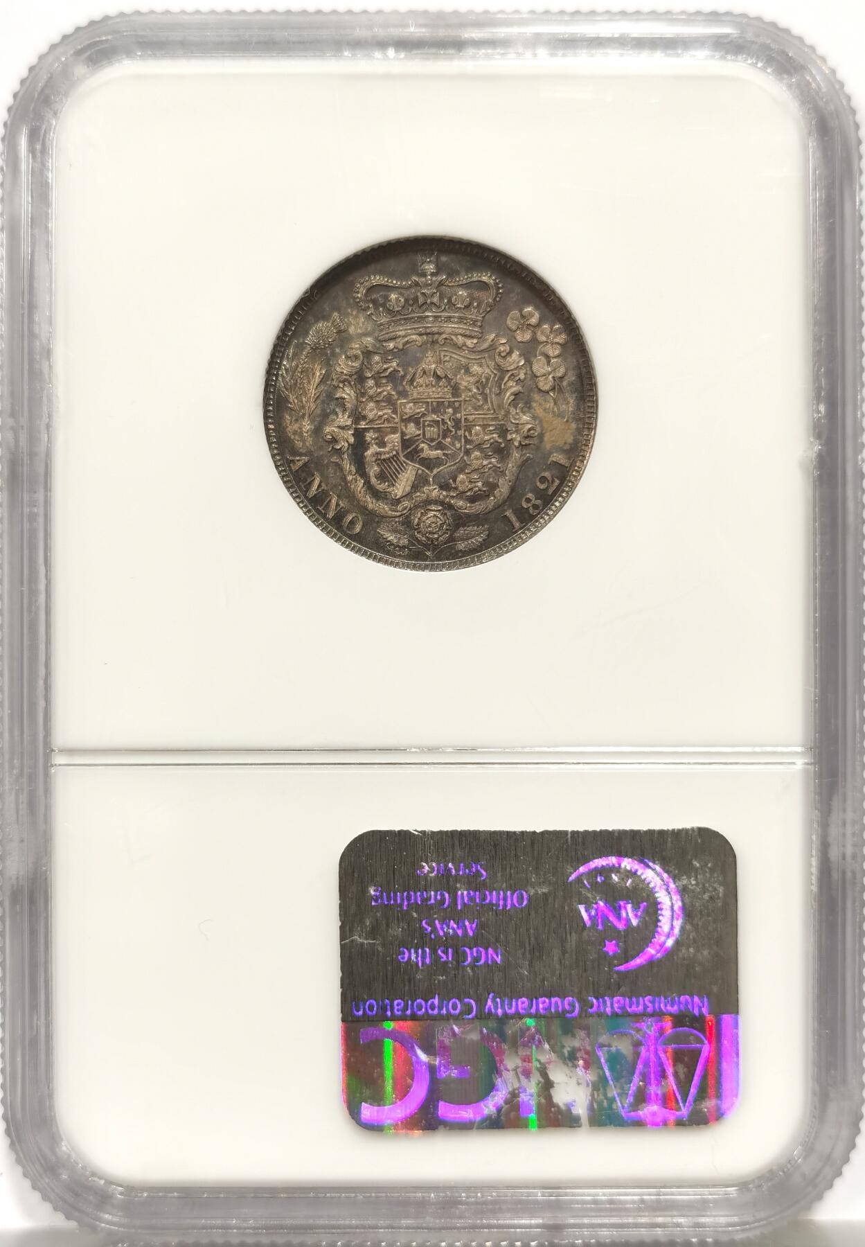 博洋堂世界钱币拍卖第158期（全场包邮） NGC MS65 英国1821年乔治三世1先令银币。极少见品种，高分相当难得。此枚顶级五彩包浆，底板几近无瑕，NGC老盒子加持，可以说是一步到位的一枚。AW此前64分曾有163170日元成交，此枚如此状态的65分值得高看一眼