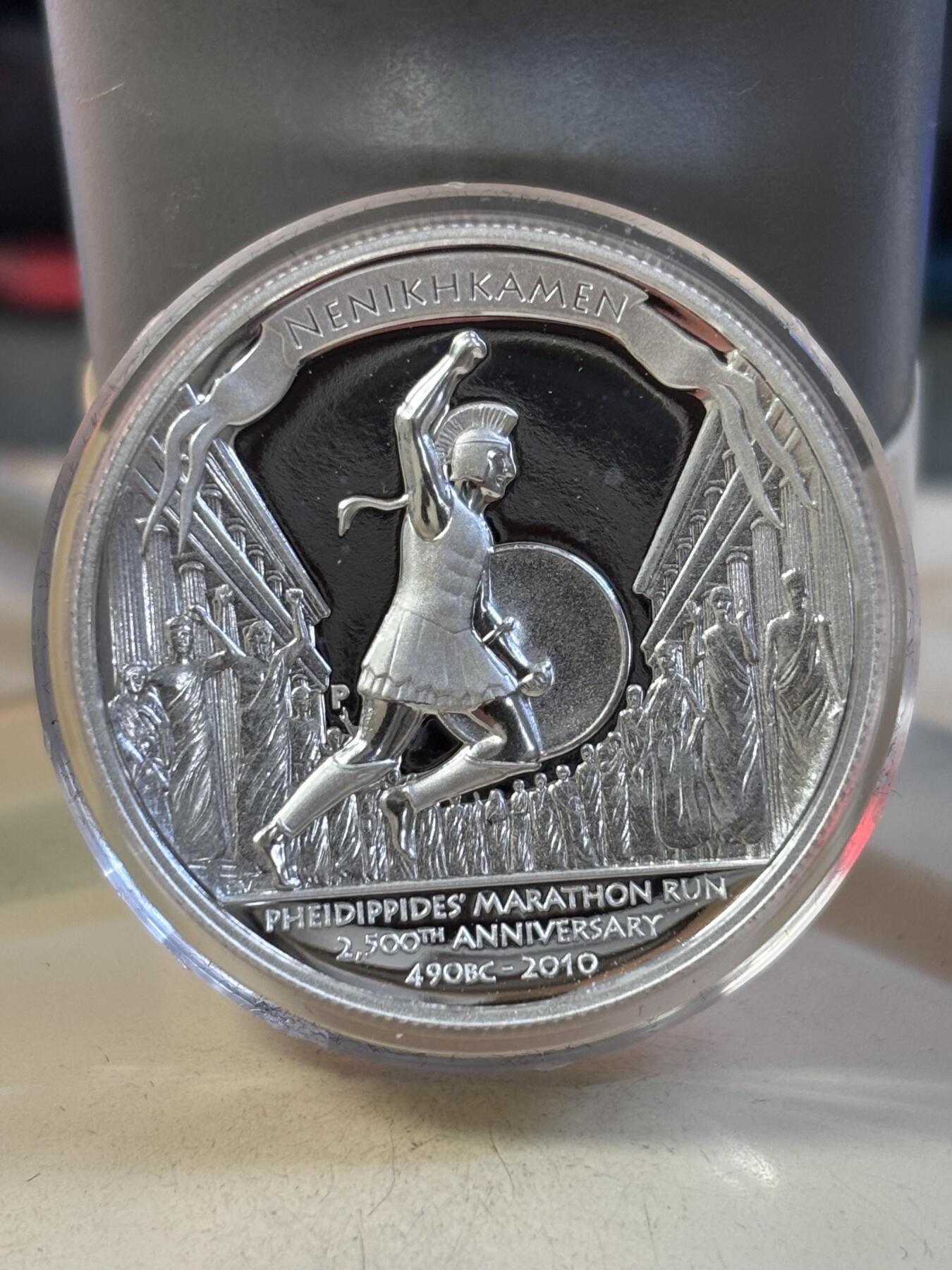 第189期拍卖 图瓦卢2010马拉松运动2500周年高浮雕加厚纪念银币，999银，1盎司，有白点