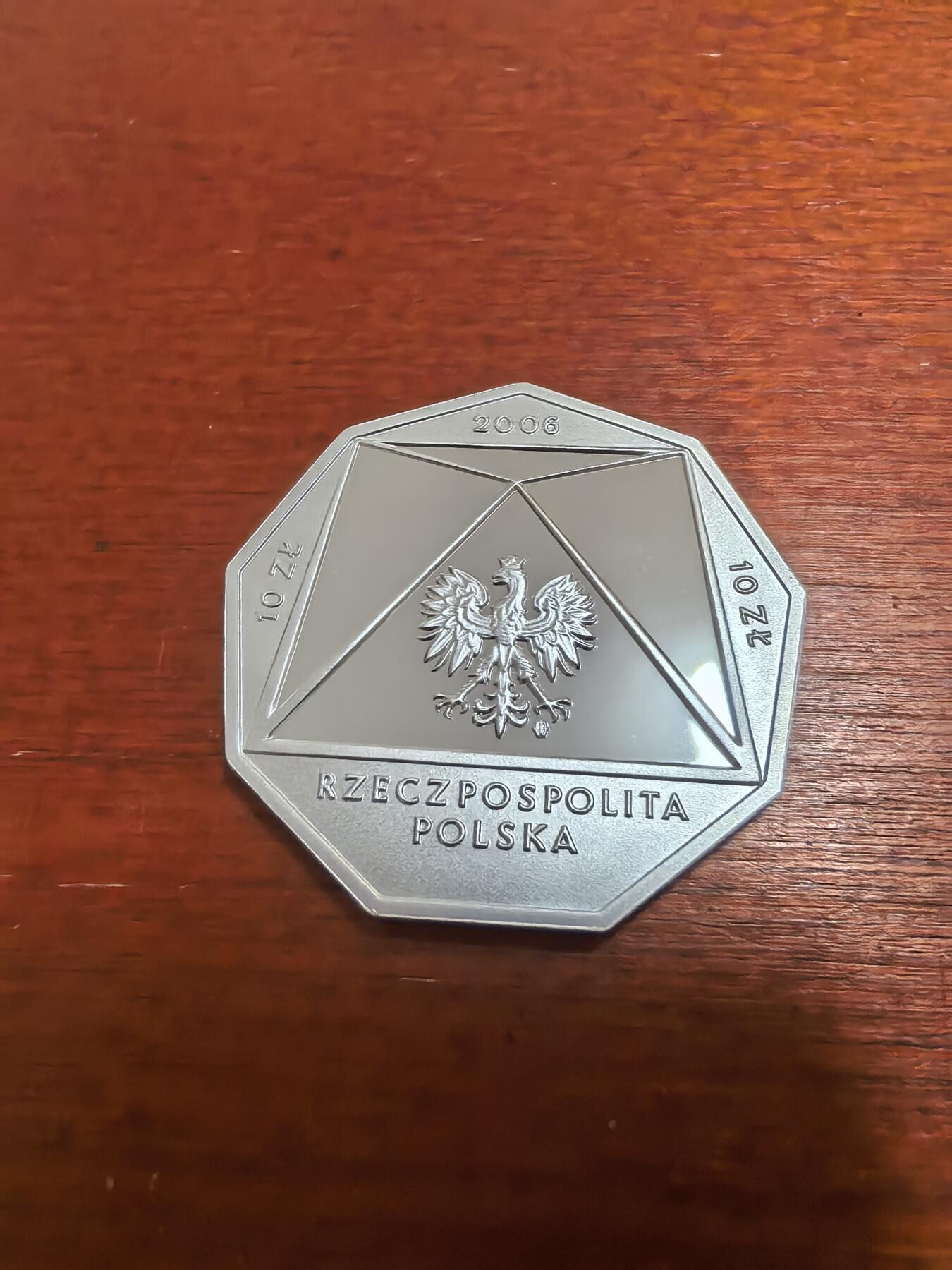 长老汇蛇年精选第九十五场拍卖 2006波兰华沙经济学院百周年10兹罗提九边形精制银币，14.14克925银，克书未记载