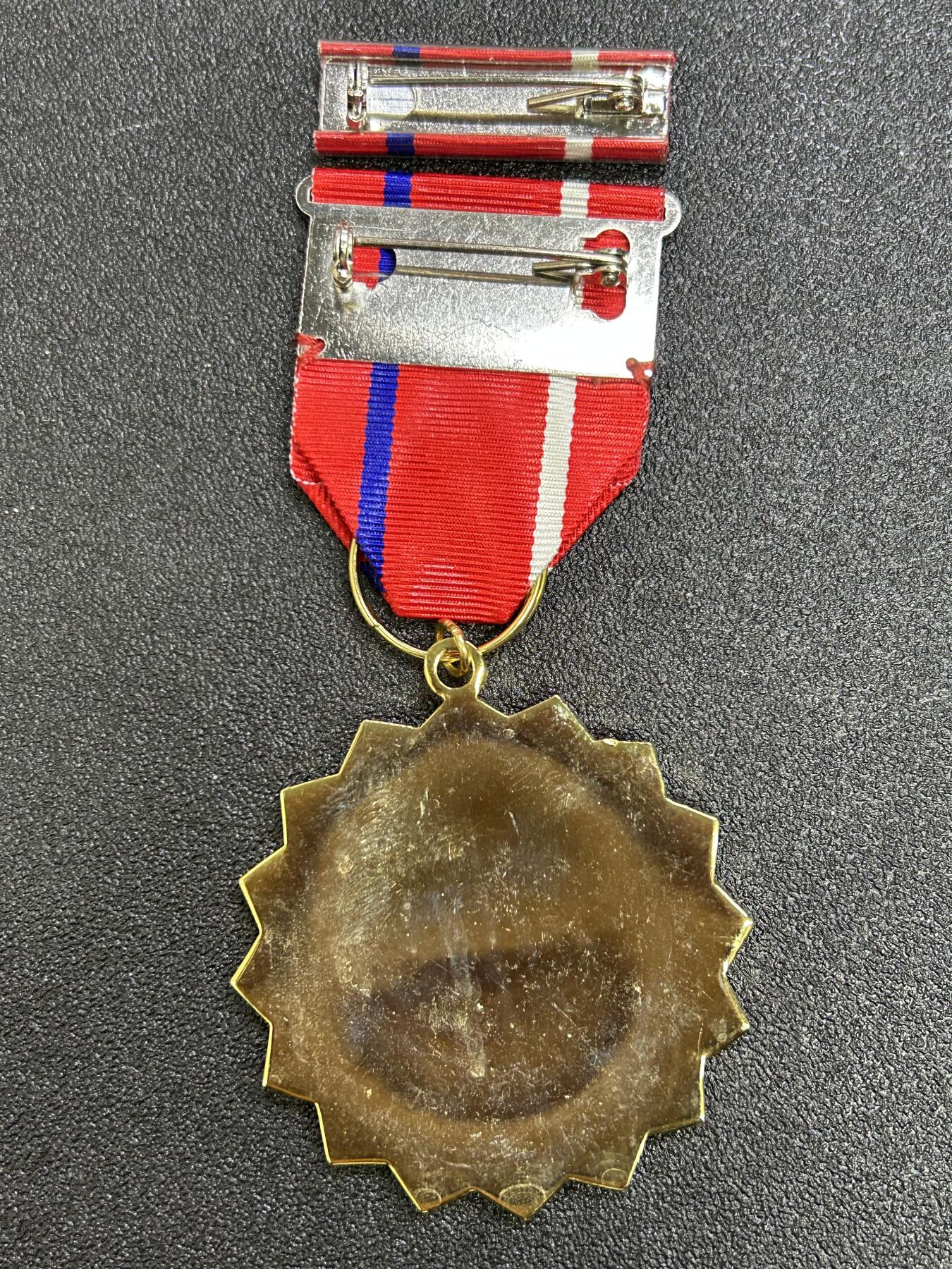 西秦中古拍卖第七十四期 民国空军乾元勋章 带勋略 退台后