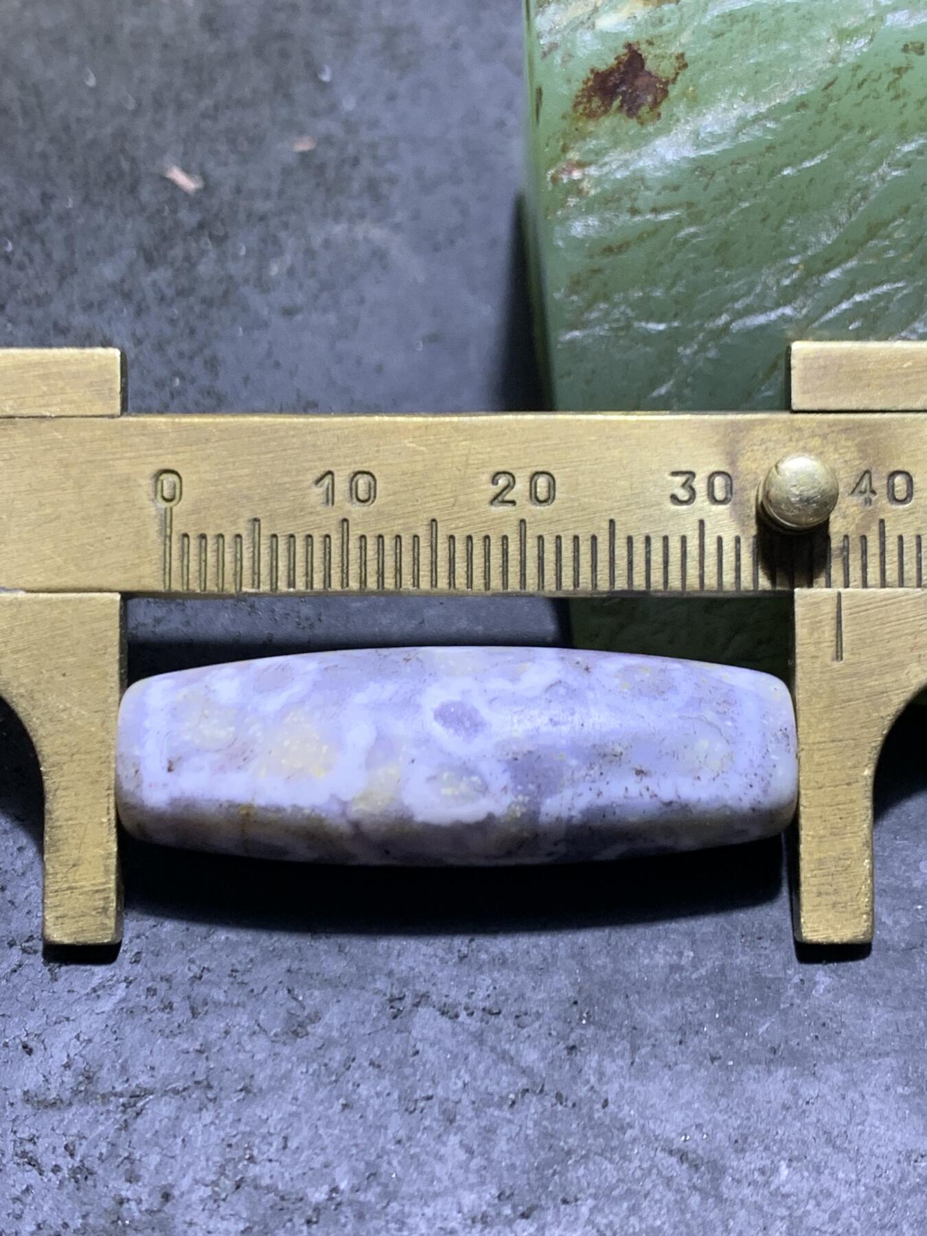 精品藏传象雄朱砂九眼随形天珠一颗