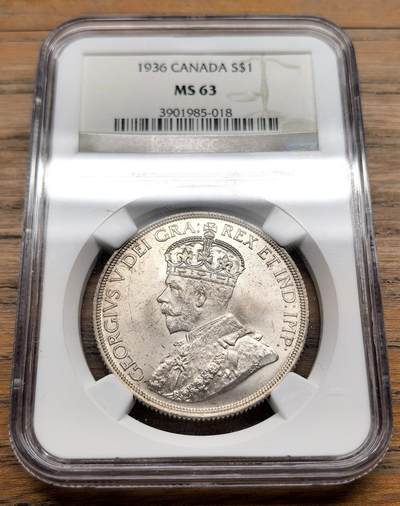 凡希社世界钱币微拍第三百十九期 - 1936加拿大乔五dollar大银NGC-MS63，淡彩紫金包浆，光泽极养眼的一枚！