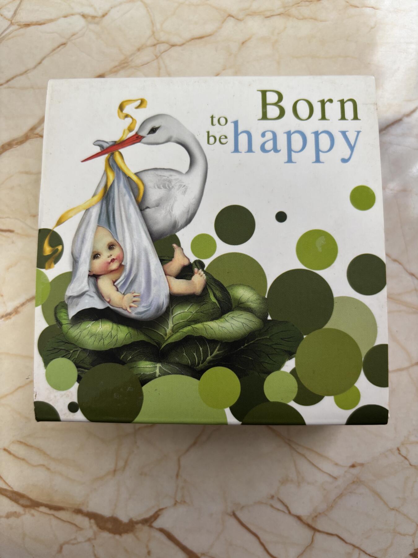 第189期拍卖 喀麦隆2020年送子鸟新生婴儿多边形彩色纪念银币，999银，16.81克，发行999枚，有起泡