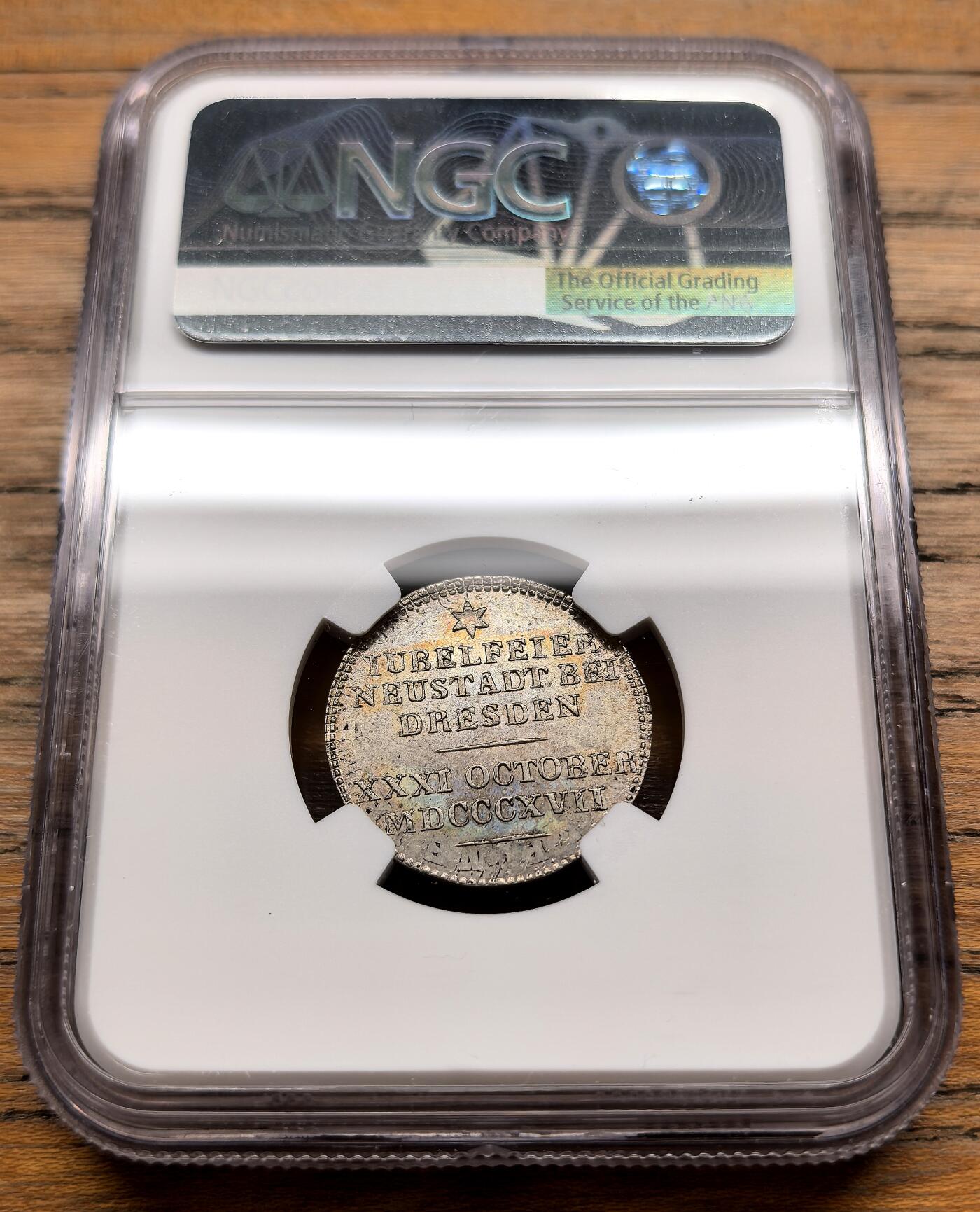 凡希社世界钱币微拍第三百十九期 1817德国德累斯顿新城区宗教改革300周年纪念杜卡特型银质币章NGC-MS64，淡彩，收藏级品相！