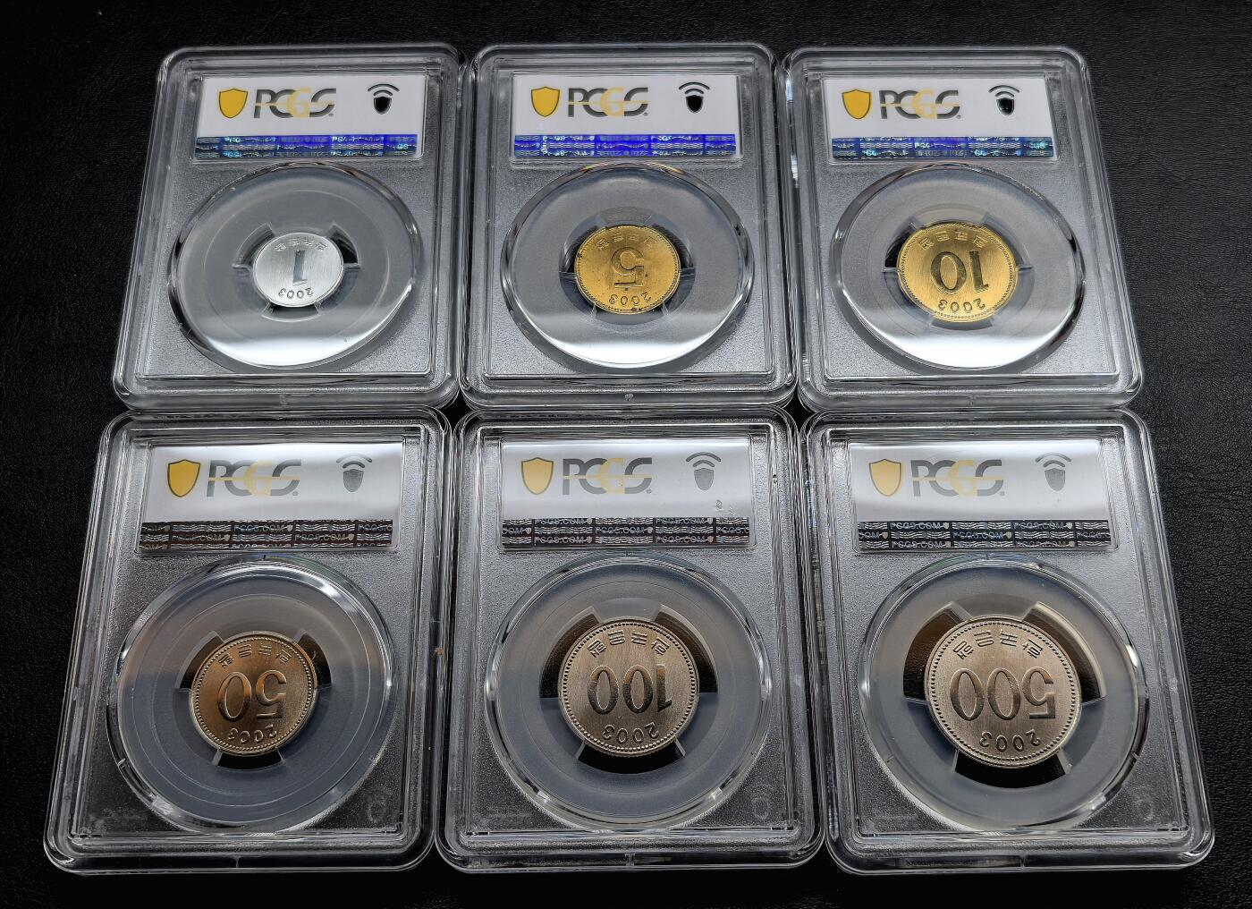 凡希社世界钱币微拍第三百十九期 荐！2003韩国“反向精制”流通样币六枚套PCGS-SP67/68/69，币面的喷砂面和高光镜面与普通精制正好相反，珍稀，P唯一一套评级记录。