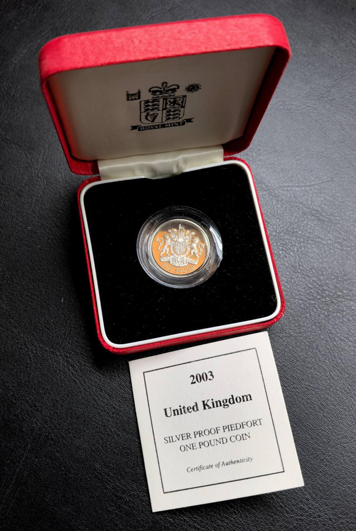 凡希社世界钱币微拍第三百十九期 2003英国加厚银镑原厂盒证全品，19g，925银。