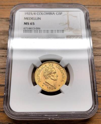 凡希社世界钱币微拍第三百十九期 - 1925/4哥伦比亚麦德林厂5比索金币NGC-MS65，高分收藏级，7.988g，917金。