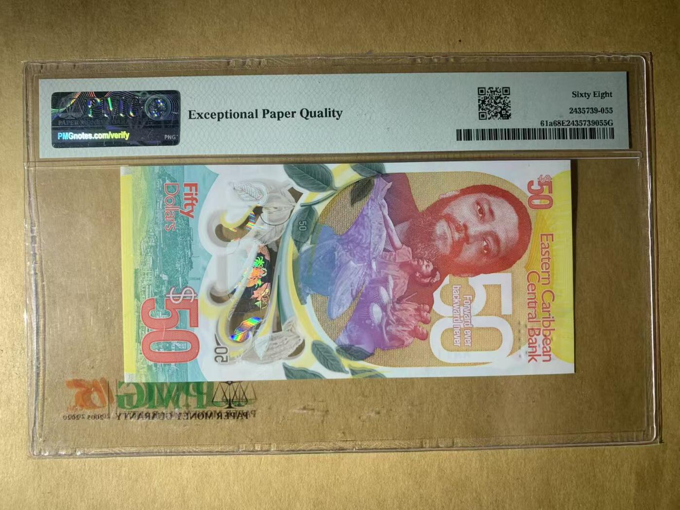 【礼羽收藏】🌏世界钱币拍卖第122期 【AA111008】全新UNC 2024年东加勒比50元塑料纪念钞 AA首发冠 无3457尾008 数三 倒置号 PMG68 高分靓号