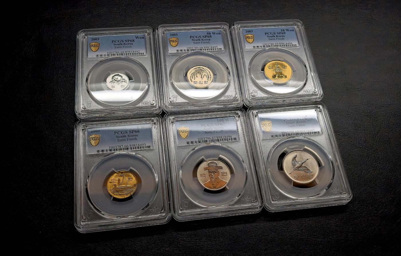 凡希社世界钱币微拍第三百十九期 荐！2003韩国“反向精制”流通样币六枚套PCGS-SP67/68/69，币面的喷砂面和高光镜面与普通精制正好相反，珍稀，P唯一一套评级记录。