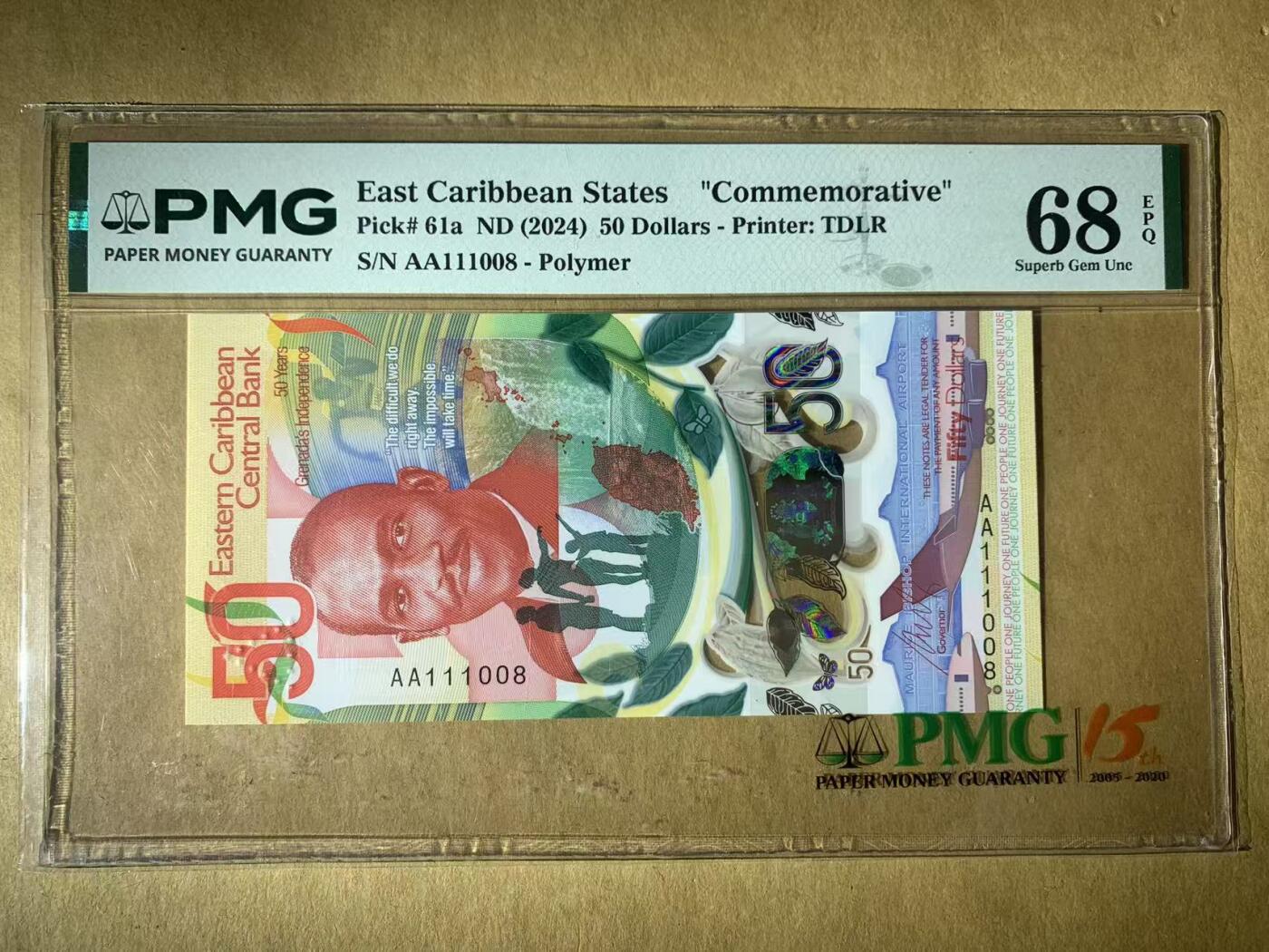 【礼羽收藏】🌏世界钱币拍卖第122期 【AA111008】全新UNC 2024年东加勒比50元塑料纪念钞 AA首发冠 无3457尾008 数三 倒置号 PMG68 高分靓号