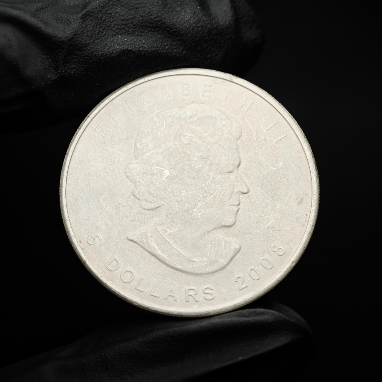 金瓯小拍第三期 古今币章 银价专场 加拿大枫叶银币2008年 重31.3克直径38mm 品相一般 磨砂处理+划痕