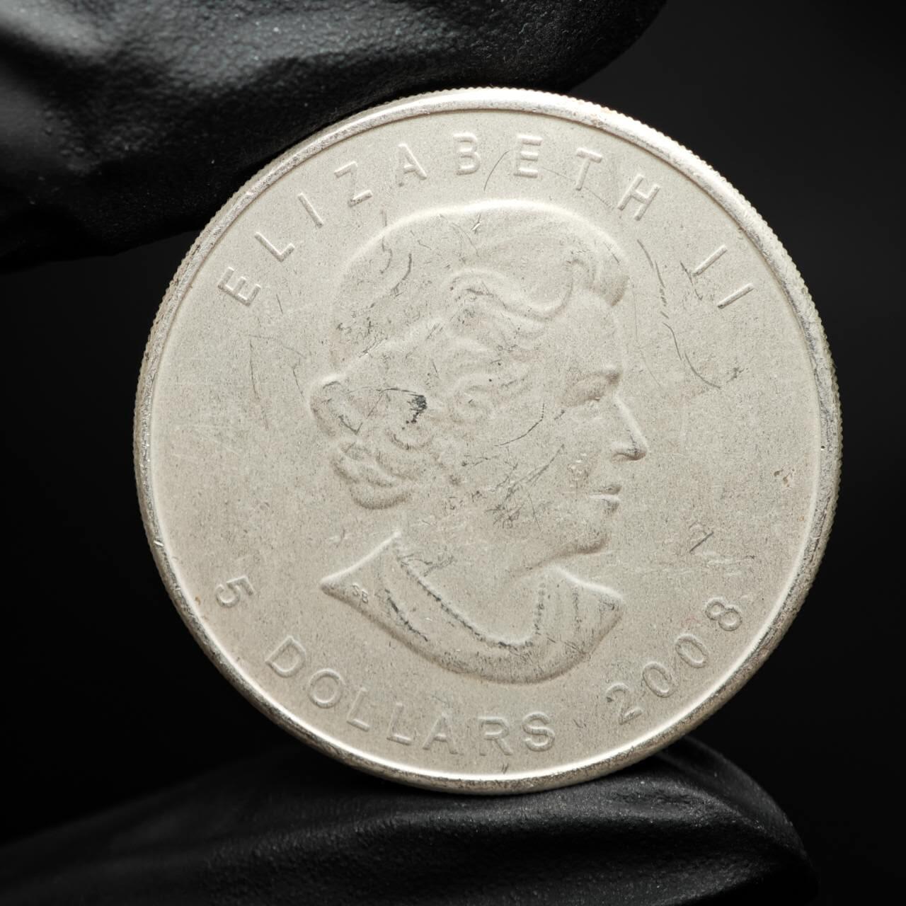 金瓯小拍第三期 古今币章 银价专场 加拿大枫叶银币2008年 重31.3克直径38mm 品相一般 磨砂处理+划痕