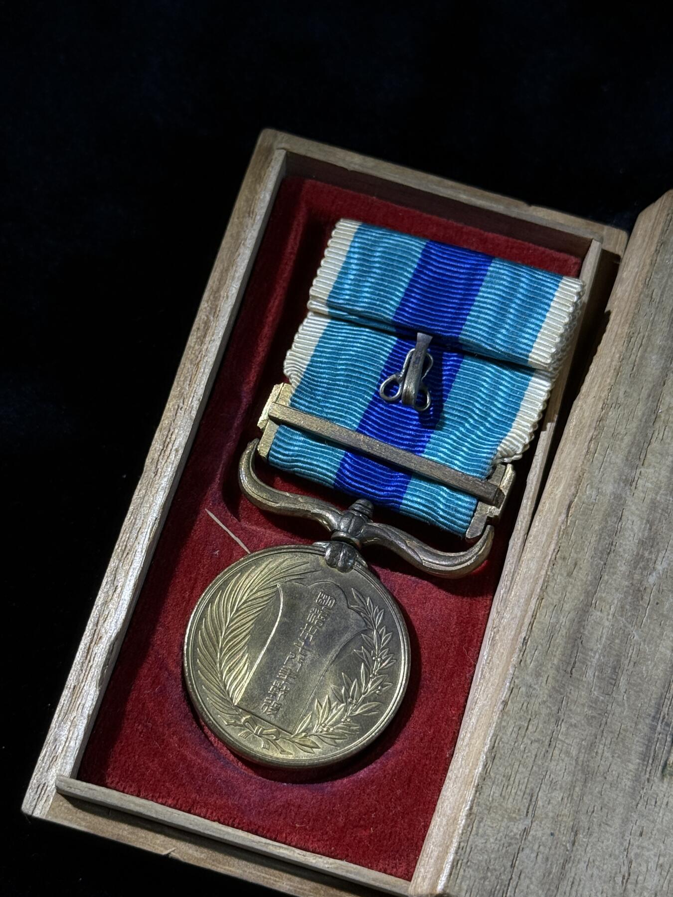 戎马世界章牌大赏第110期 日俄战役从军记章，螺杆处有松动