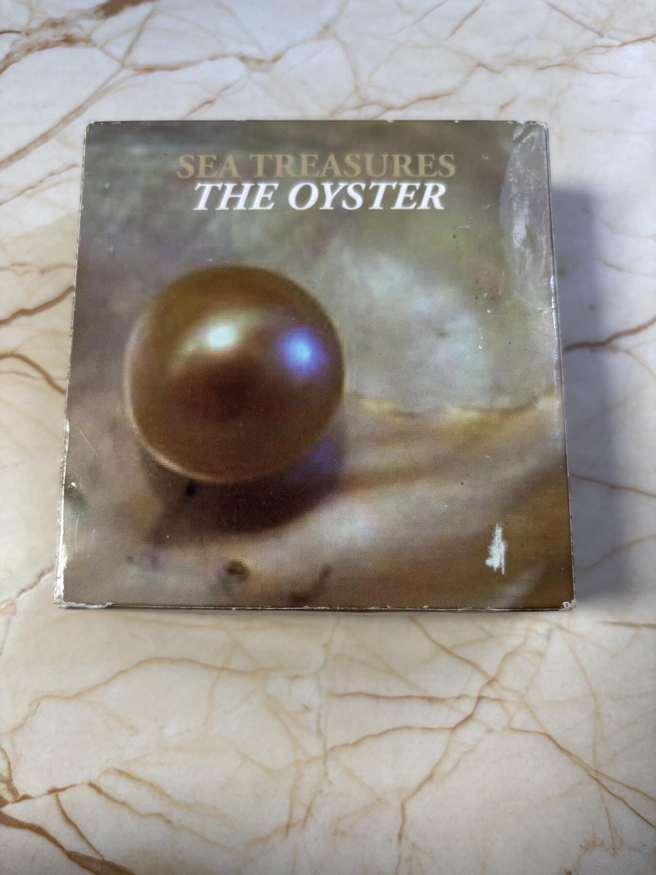 第189期拍卖 获奖帕劳2011年玉蚌含珠镶嵌珍珠异形纪念银币，25克，925银，发行2500枚