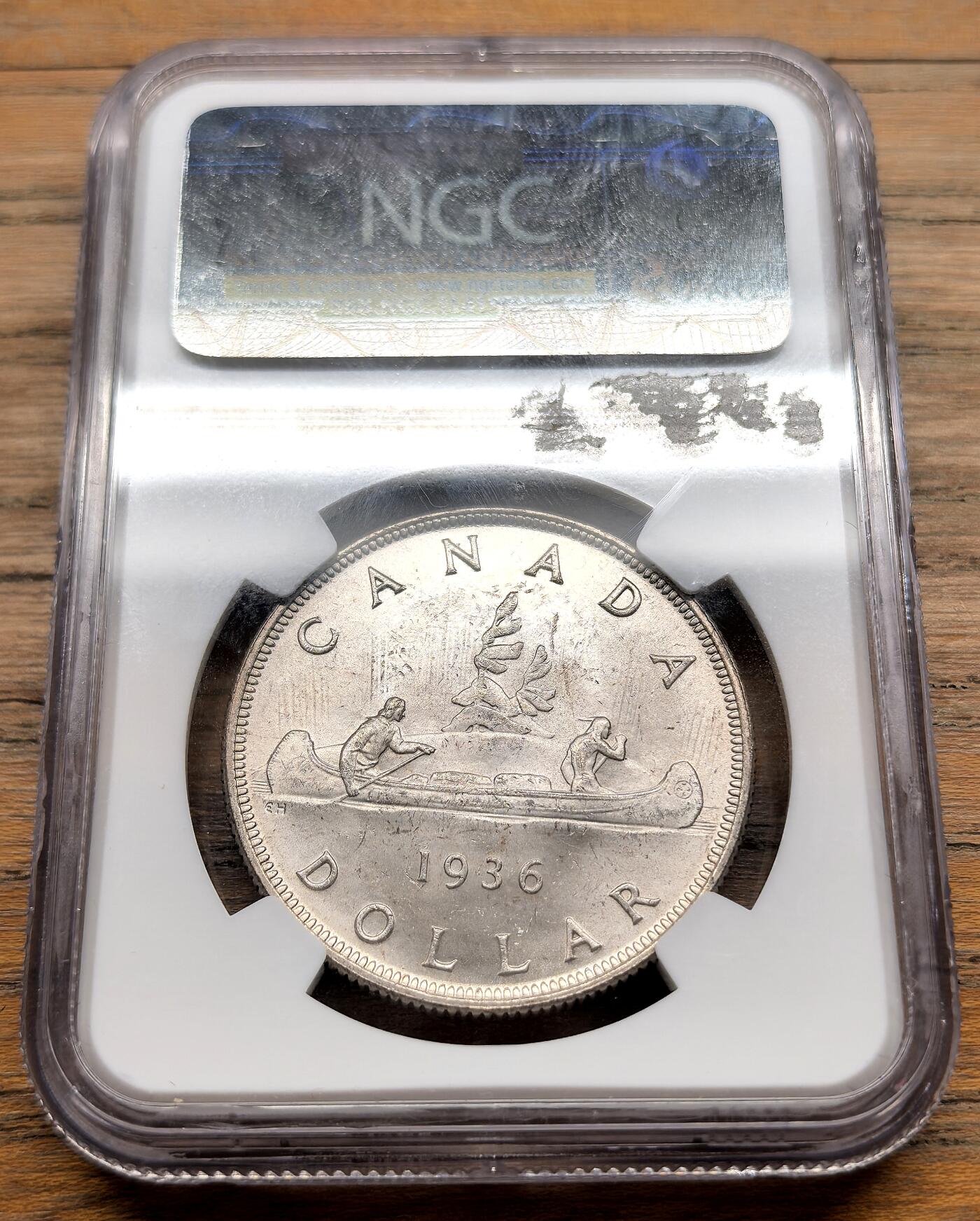 凡希社世界钱币微拍第三百十九期 1936加拿大乔五dollar大银NGC-MS63，淡彩紫金包浆，光泽极养眼的一枚！