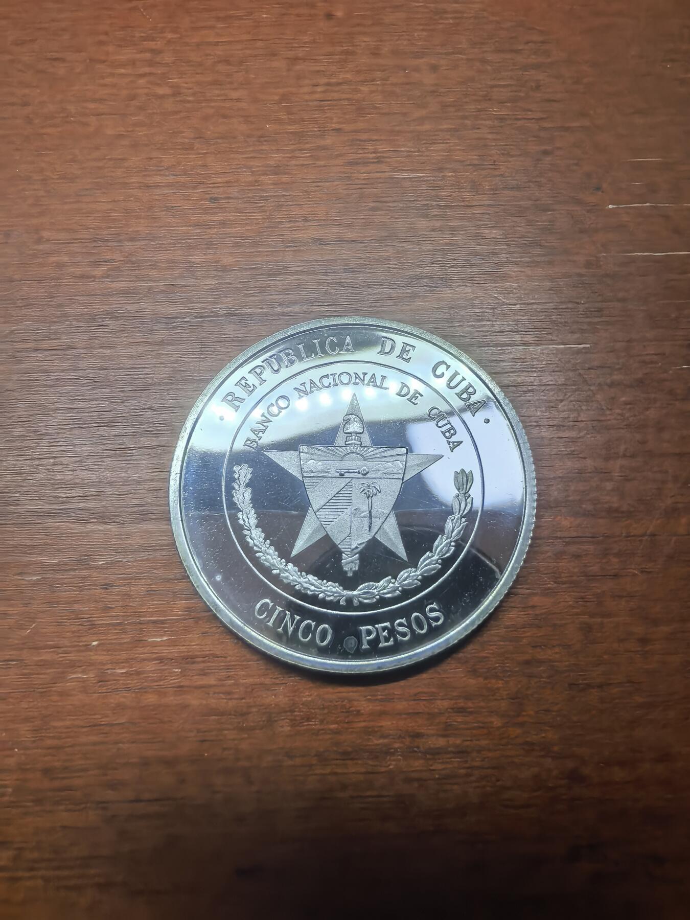 长老汇蛇年精选第九十五场拍卖 1975古巴国家银行成立25周年5比索精制银币，13.33克900银，首枚5比索银币