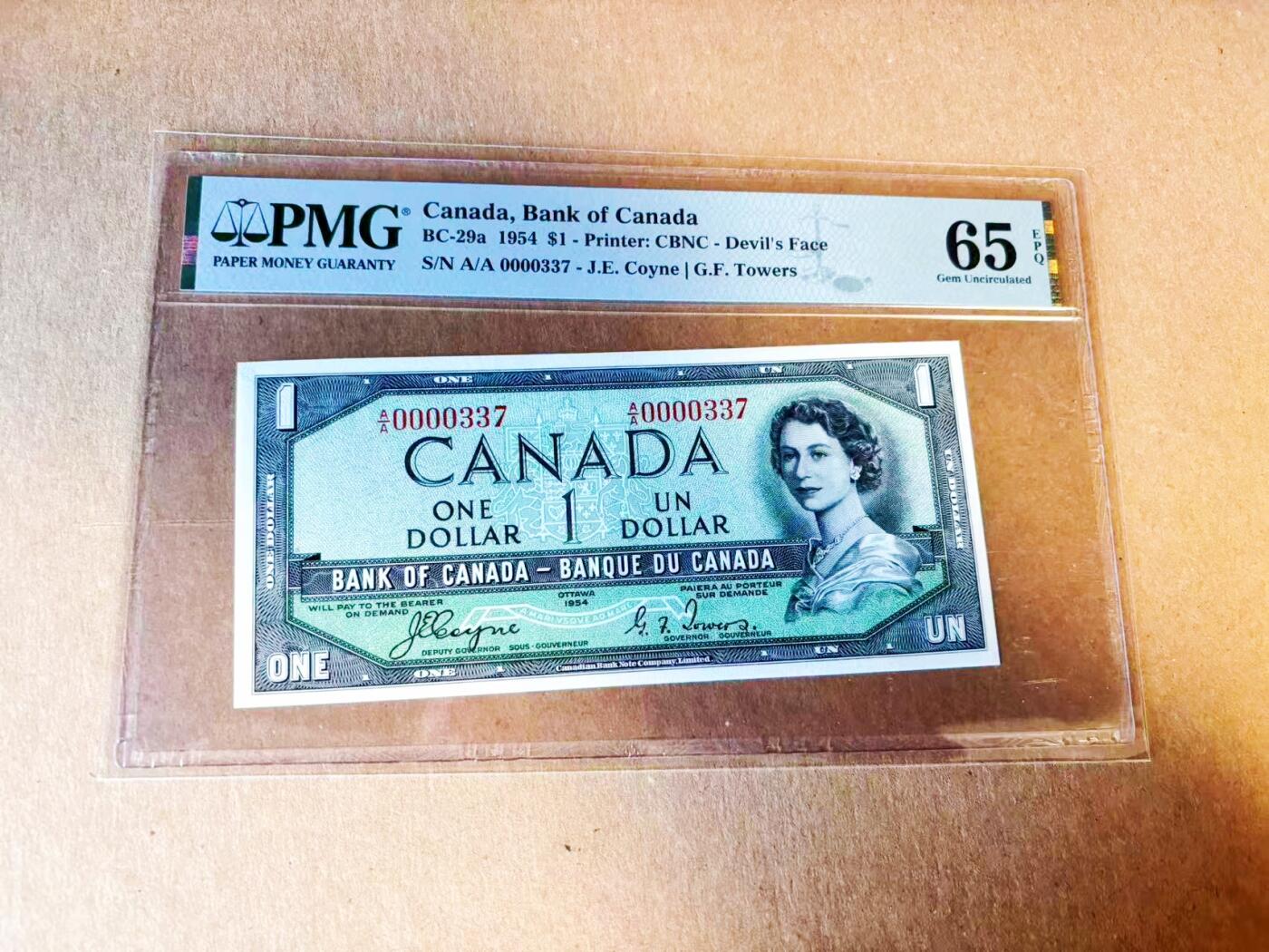 【Blue Auction】世界纸币精拍第779期——18级TOP拍卖/信誉/品质/专业/高效💫 【魔鬼脸 A/A首发冠 百位小号】加拿大1954年1元 PMG65EPQ