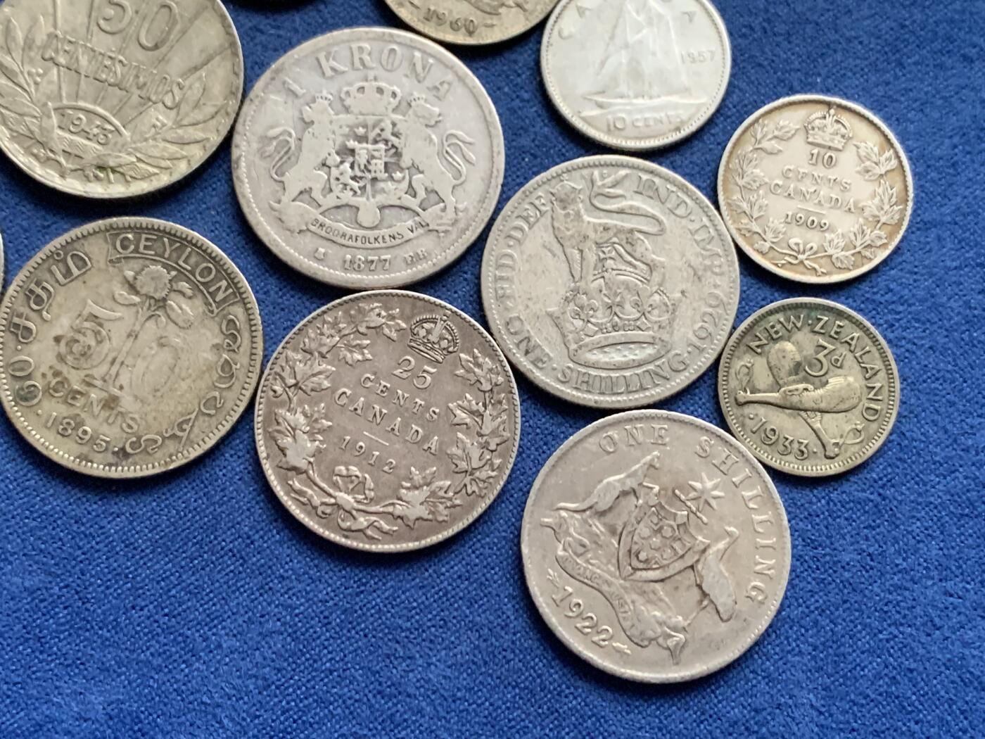 《竞宝斋》第461场 周日，周一，2场连拍 （全场包邮）欢迎送拍 15枚一组 各国银币 荷兰1盾（720银9.8克）+乌拉圭50分（720银7克）+瑞典1克朗（800银7.15克）+德国1马克（900银5.35克）+澳大利亚1先令（925银5.55克）+加拿大25分（925银5.75克）+英国1先令（500银5.37克）+巴拿马1/4巴尔博亚（900银6.15克）+锡兰50分（800银5.62克）+德国半马克（900银2.75克）+澳大利亚6便士（500银2.8