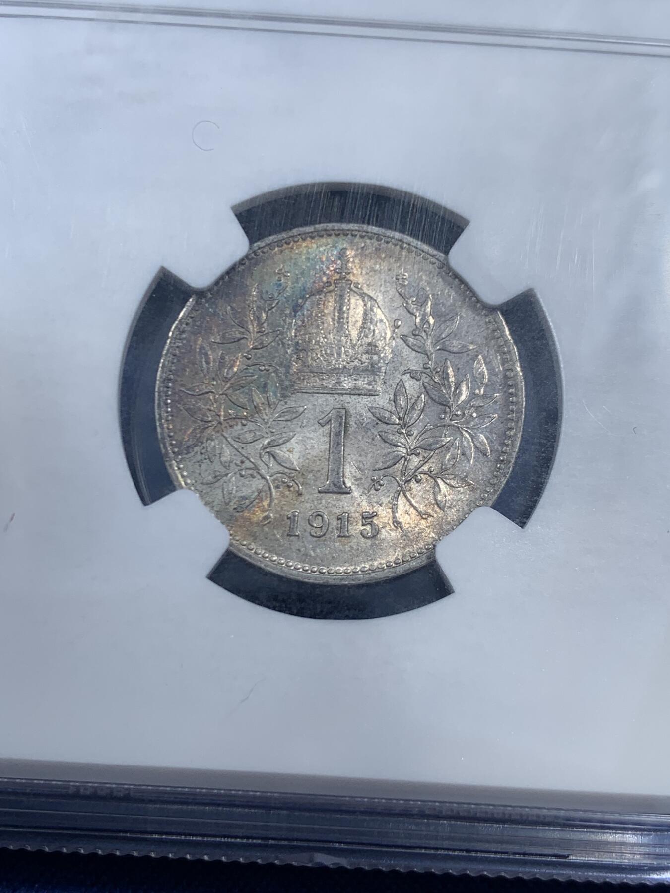 《竞宝斋》第461场 周日，周一，2场连拍 （全场包邮）欢迎送拍 NGC MS62 奥地利 奥匈帝国 1915年 1克朗银币 数字面清新的色阶五彩 盒子左边缘有磕