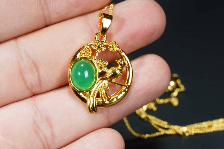 上海都达杂项专场八（全场包邮）   天然镀金喜上眉梢嵌绿玛瑙蛋面挂件 附鉴定证书87-357