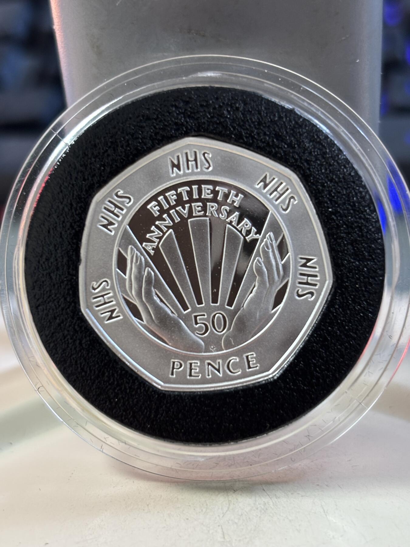 第189期拍卖 英国1998年国家医疗50便士精制加厚纪念银币，16克，925银，