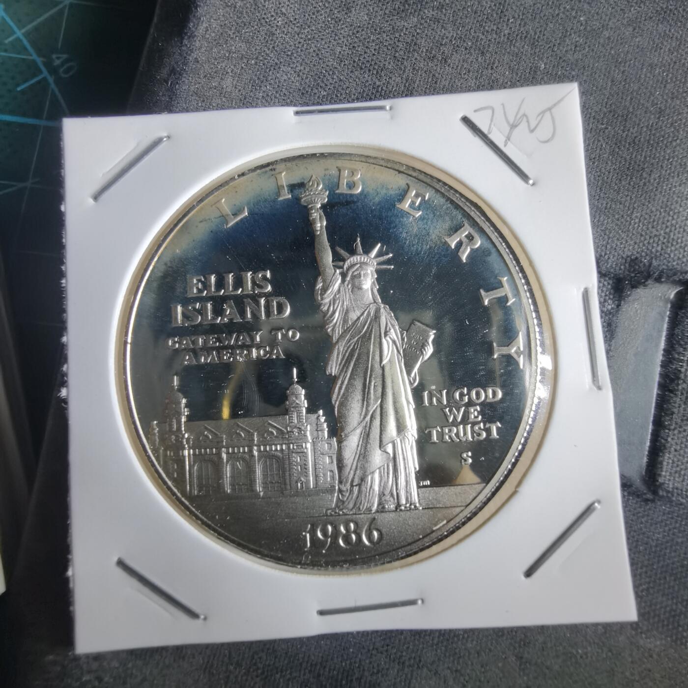 沼泽如烟--第974场 美国1986年一元精制币银币