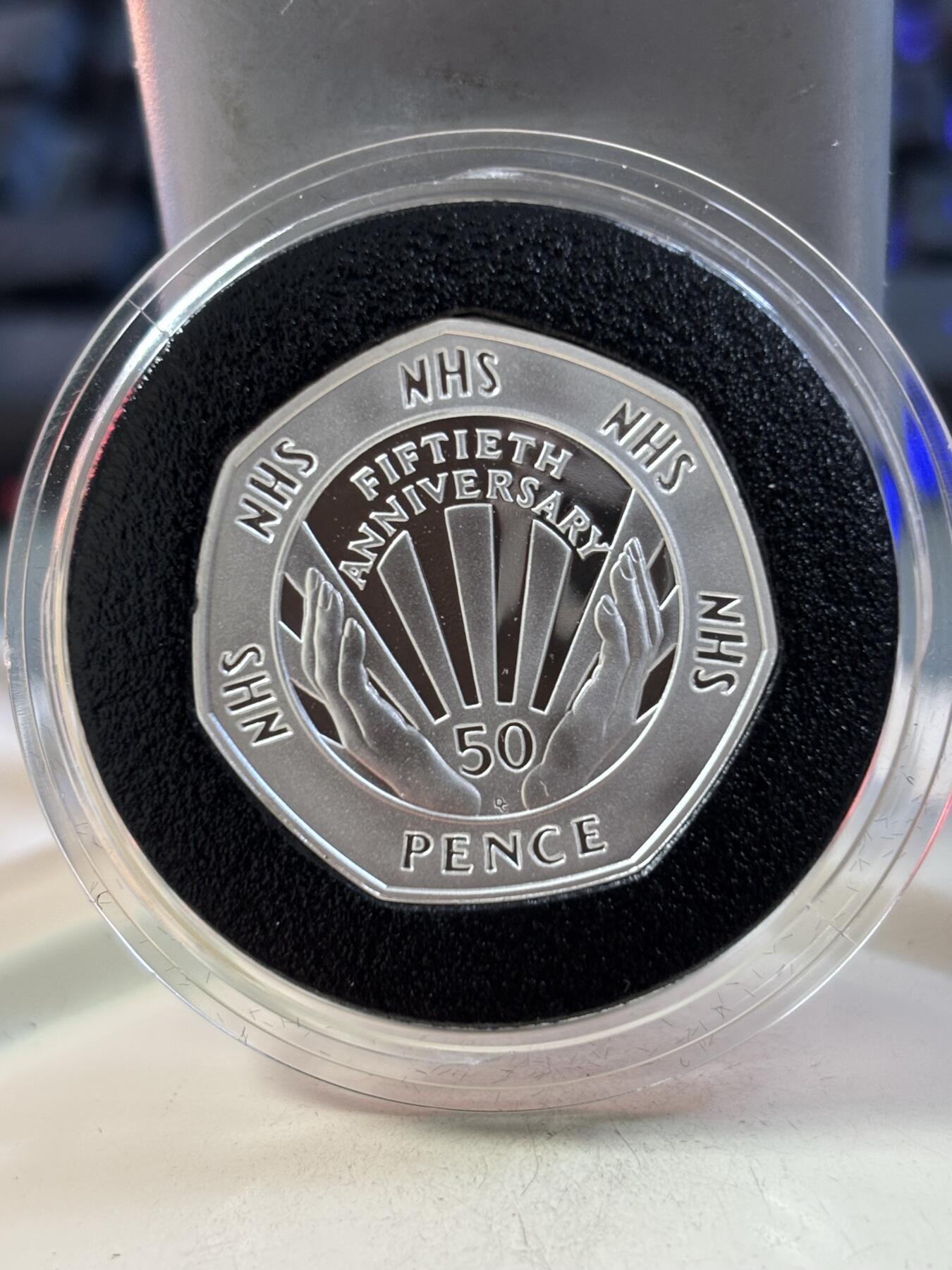 第189期拍卖 英国1998年国家医疗50便士精制加厚纪念银币，16克，925银，