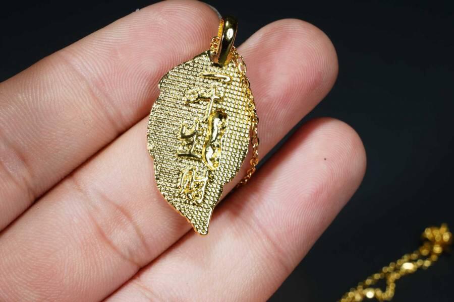 上海都达杂项专场八（全场包邮）   天然镀金一叶生财嵌绿玛瑙蛋面挂件 附鉴定证书87-359