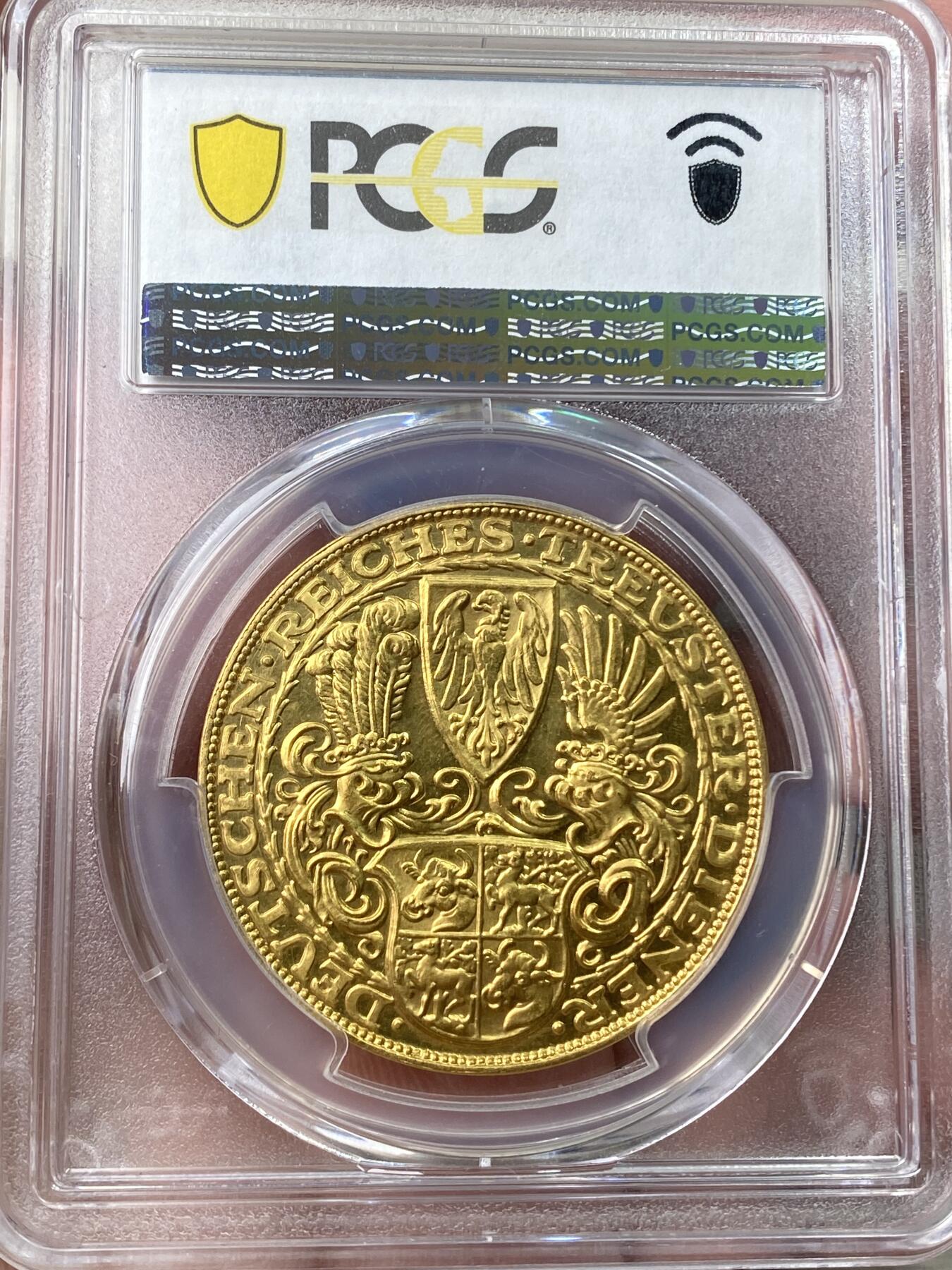 万国钱币拍卖第059期 PCGS SP63 1927年德国魏玛共和国兴登堡总统80大寿5马克金质币章 卡尔哥茨经典设计黄金化后异常诱人 其镜子般的深度镜面令人着迷 大尺寸金章无论何时均是人见人爱的品种 入手黄金的绝佳机会 22.87g 900金