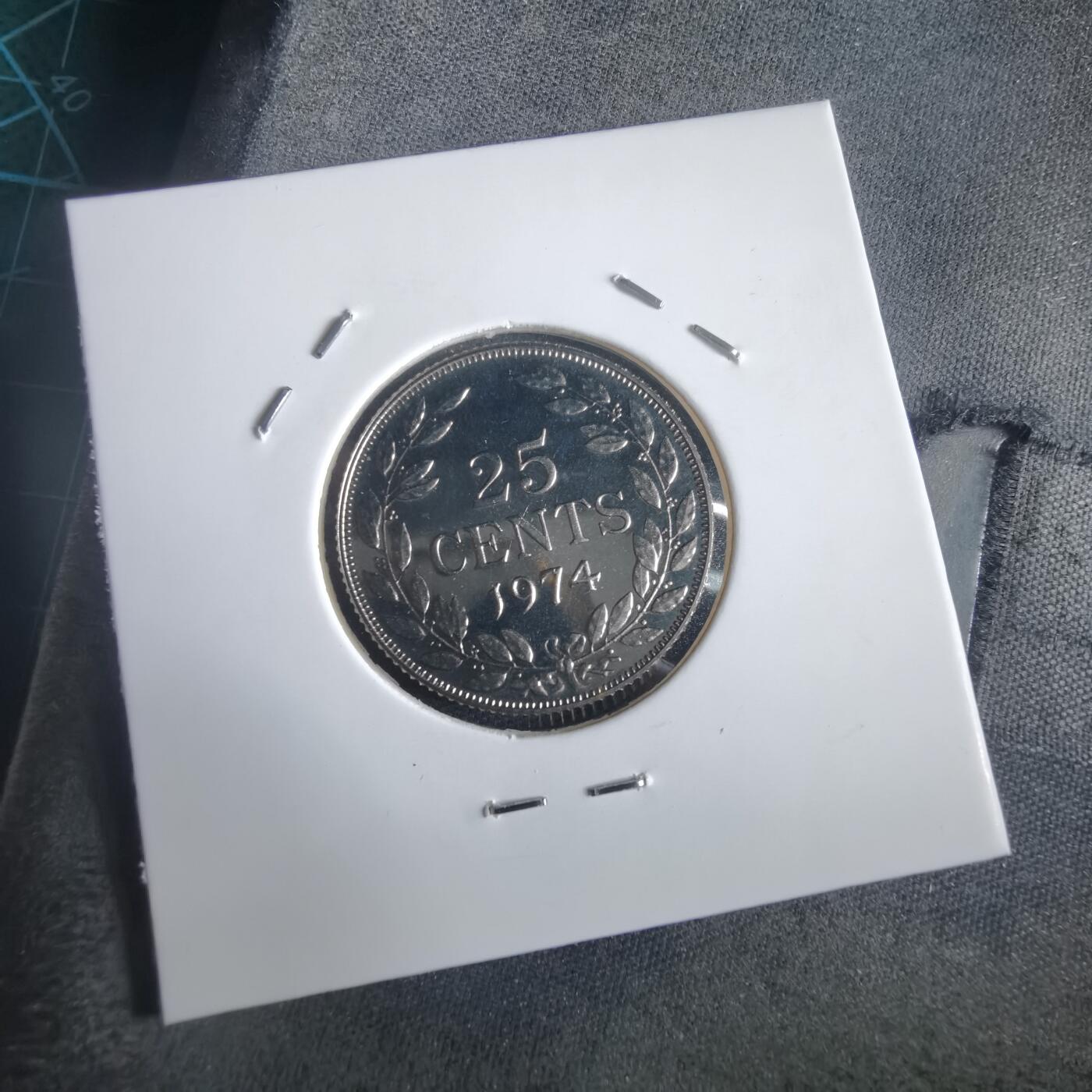 沼泽如烟--第974场 利比里亚25分精制币