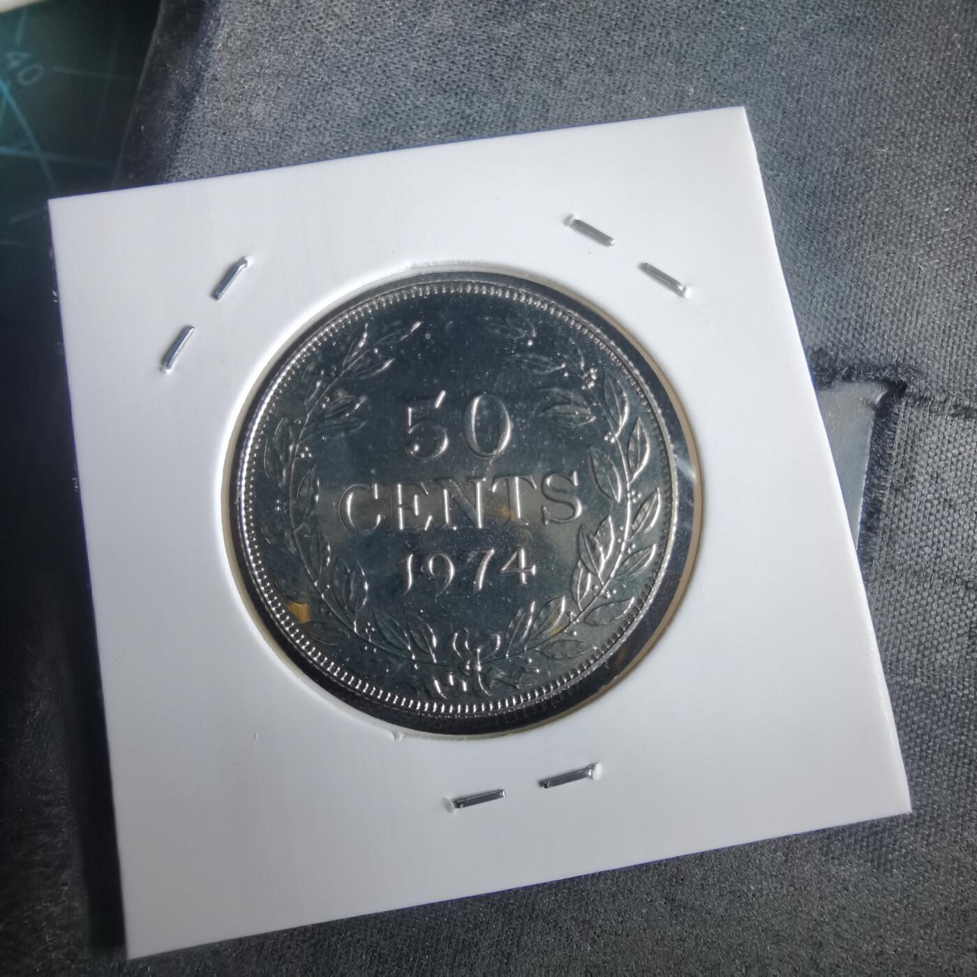 沼泽如烟--第974场 利比里亚50分精制币