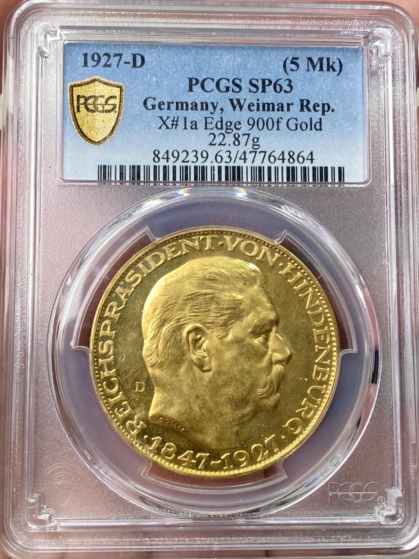 万国钱币拍卖第059期 PCGS SP63 1927年德国魏玛共和国兴登堡总统80大寿5马克金质币章 卡尔哥茨经典设计黄金化后异常诱人 其镜子般的深度镜面令人着迷 大尺寸金章无论何时均是人见人爱的品种 入手黄金的绝佳机会 22.87g 900金