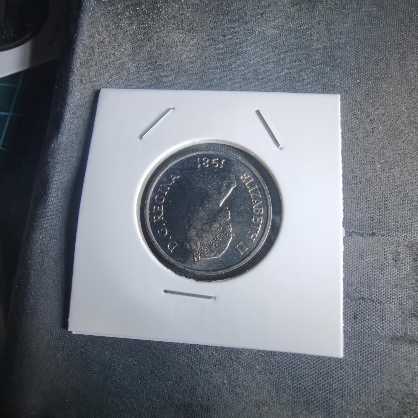 沼泽如烟--第975场 特克斯和凯科斯1981年四分之一克朗