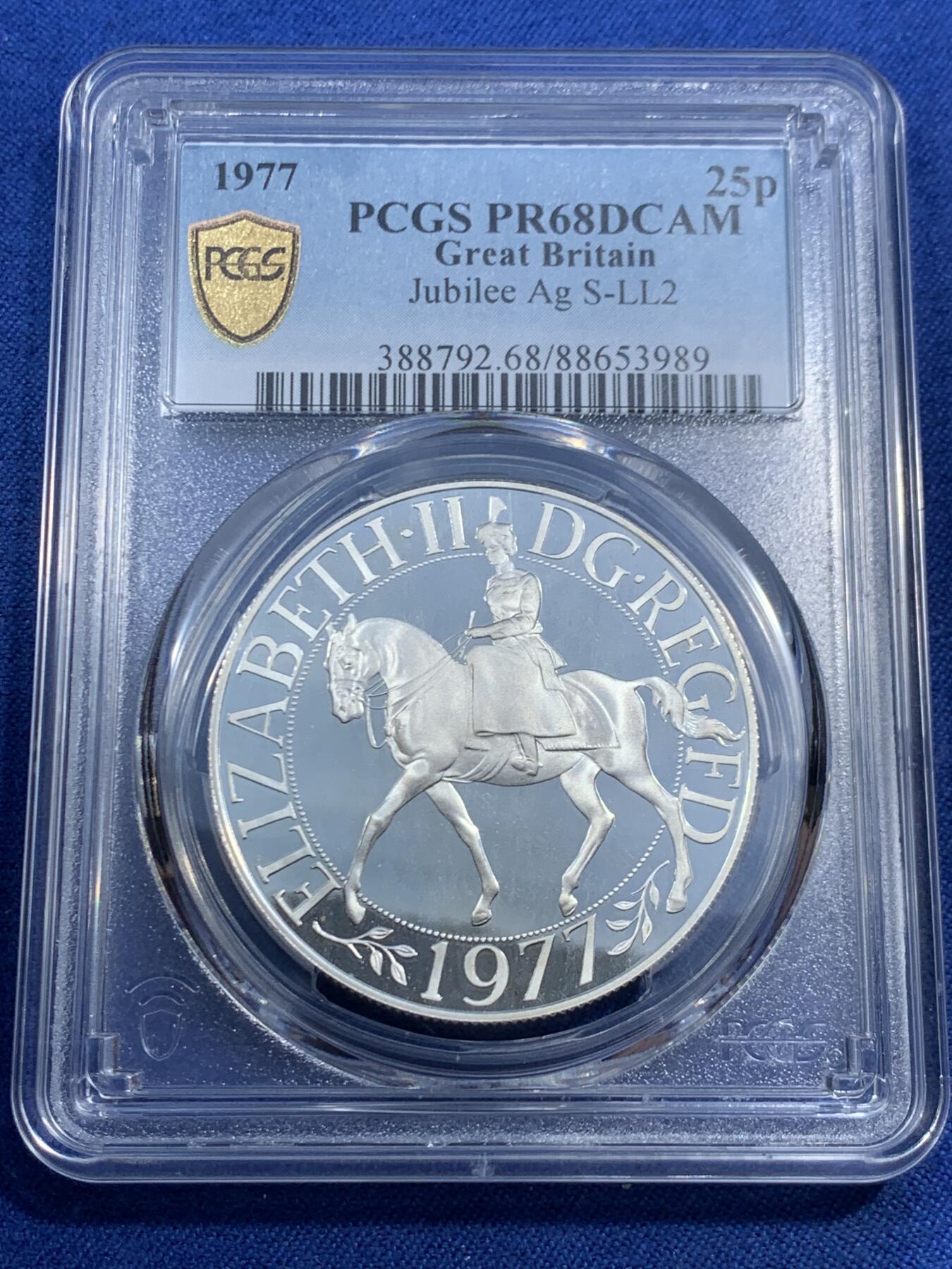 《竞宝斋》第461场 周日，周一，2场连拍 （全场包邮）欢迎送拍 PCGS PR68DCAM 英国1977年伊丽莎白女王即位25周年（银禧年）纪念克朗型精制银币
