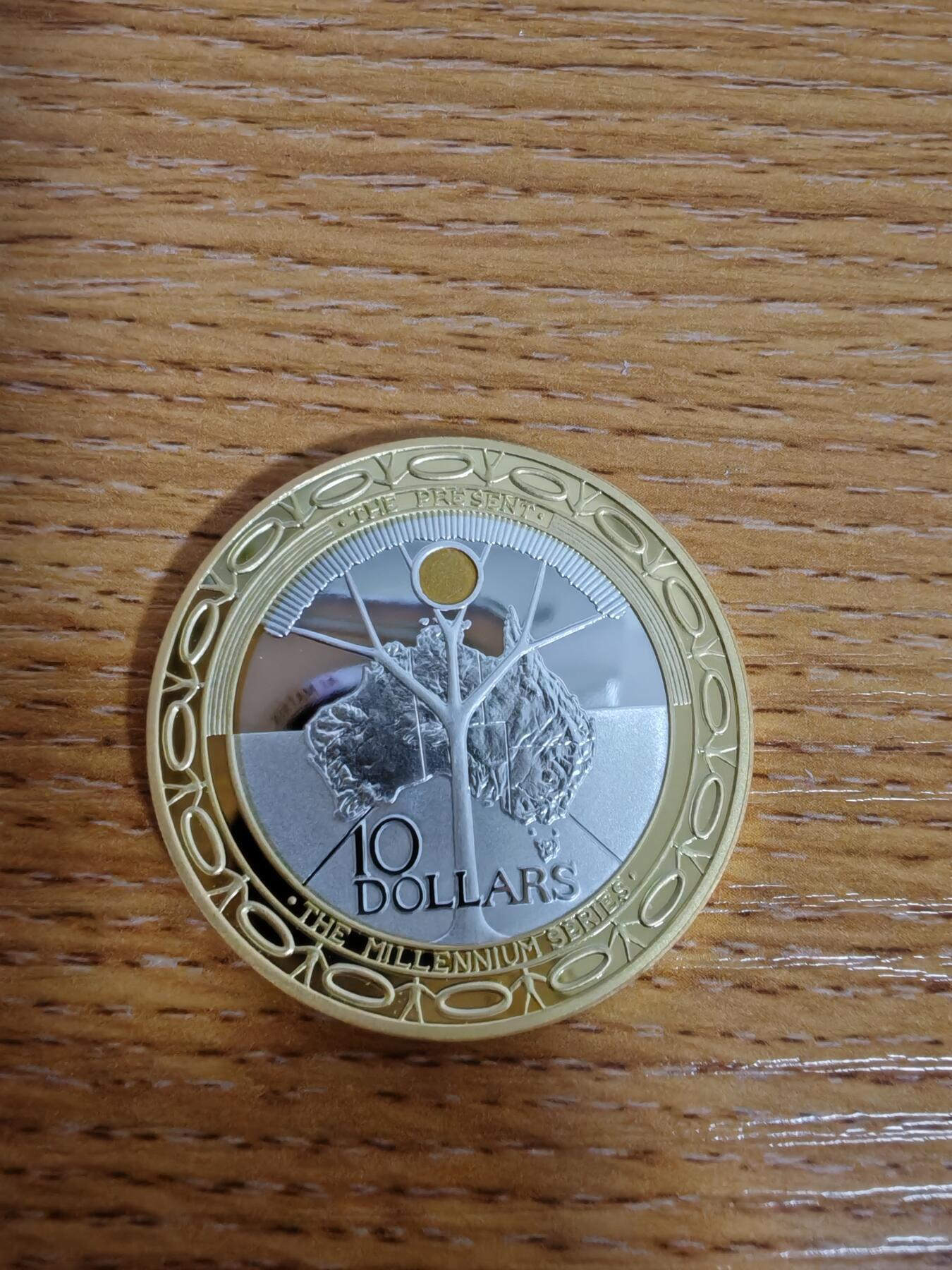 长老汇蛇年精选第九十六场拍卖 2000澳大利亚千禧年（现在）10元部分镀金精制银币，36克999银，2万枚，书标价200美金