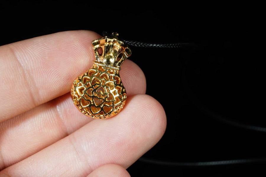 上海都达杂项专场八（全场包邮）   天然镀金福袋嵌和田玉蛋面挂件 附鉴定证书87-335