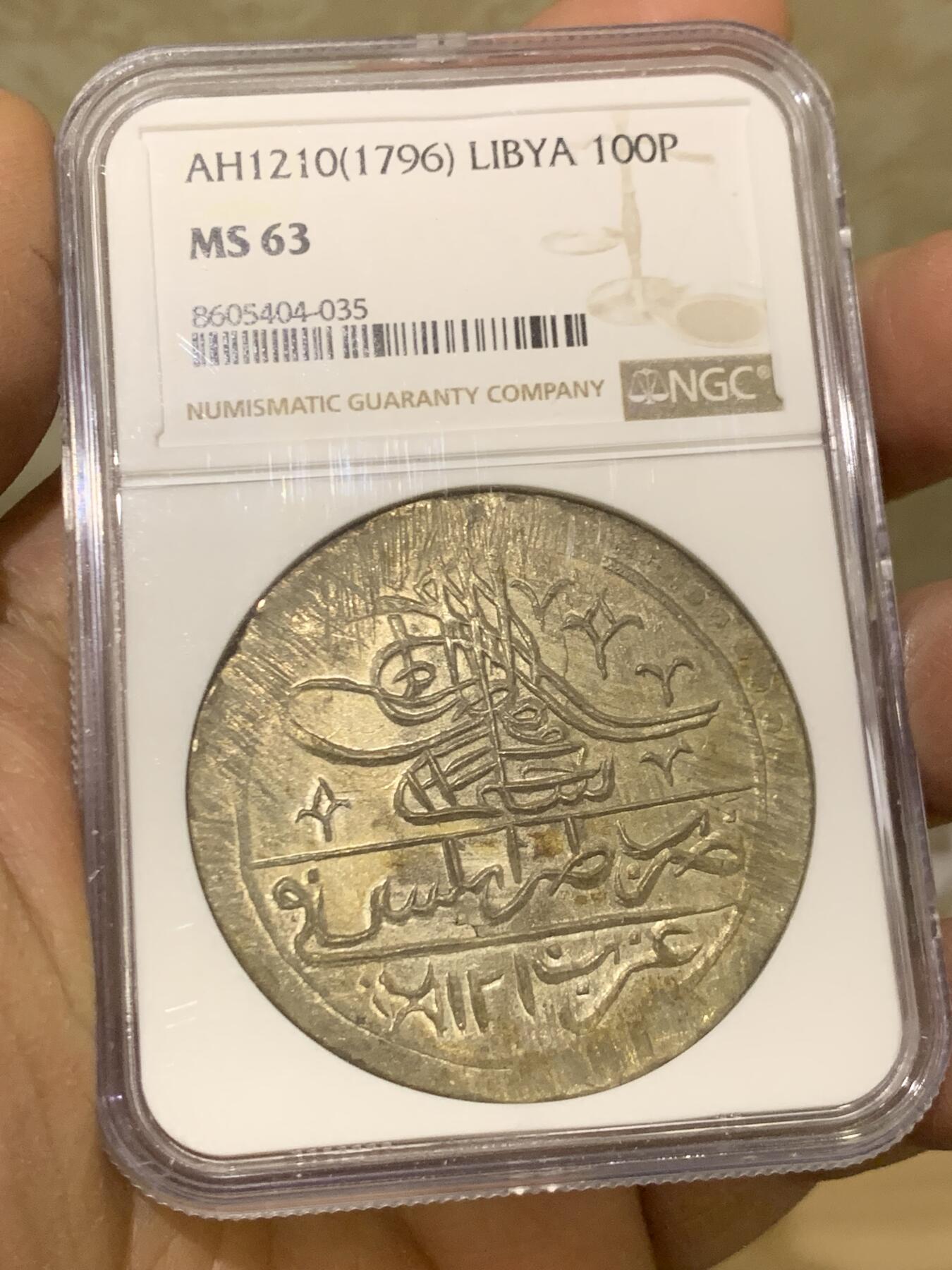 《竞宝斋》第461场 周日，周一，2场连拍 （全场包邮）欢迎送拍 NGC MS63 利比亚1796年（AH1210）年100帕拉大银币，以奥斯曼土耳其塞利姆三世的名义发行，在的黎波里铸造。实际此时的利比亚在本土贵族卡拉曼尼家族的统治下高度自治。与土耳其和其他阿拉伯大部分地区的钱币不同，利比亚地区只铸造了5个年份且数量极其稀少，此枚为最后的年份。N和P双料冠军，唯一的MS。一枚年份更常见的利比亚VF在Ha拍了一万多人民币。