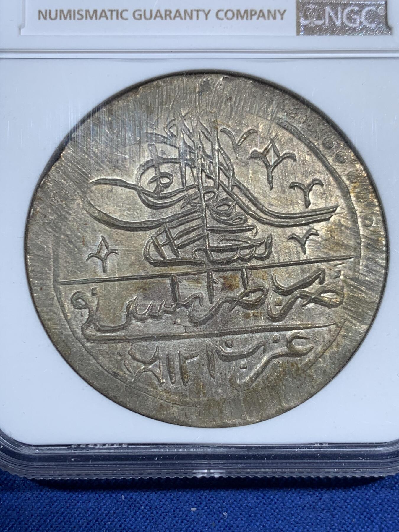 《竞宝斋》第461场 周日，周一，2场连拍 （全场包邮）欢迎送拍 NGC MS63 利比亚1796年（AH1210）年100帕拉大银币，以奥斯曼土耳其塞利姆三世的名义发行，在的黎波里铸造。实际此时的利比亚在本土贵族卡拉曼尼家族的统治下高度自治。与土耳其和其他阿拉伯大部分地区的钱币不同，利比亚地区只铸造了5个年份且数量极其稀少，此枚为最后的年份。N和P双料冠军，唯一的MS。一枚年份更常见的利比亚VF在Ha拍了一万多人民币。