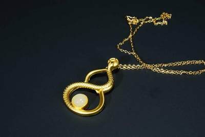 上海都达杂项专场八（全场包邮）   天然镀金蛇形葫芦嵌和田玉蛋面挂件 附鉴定证书87-341