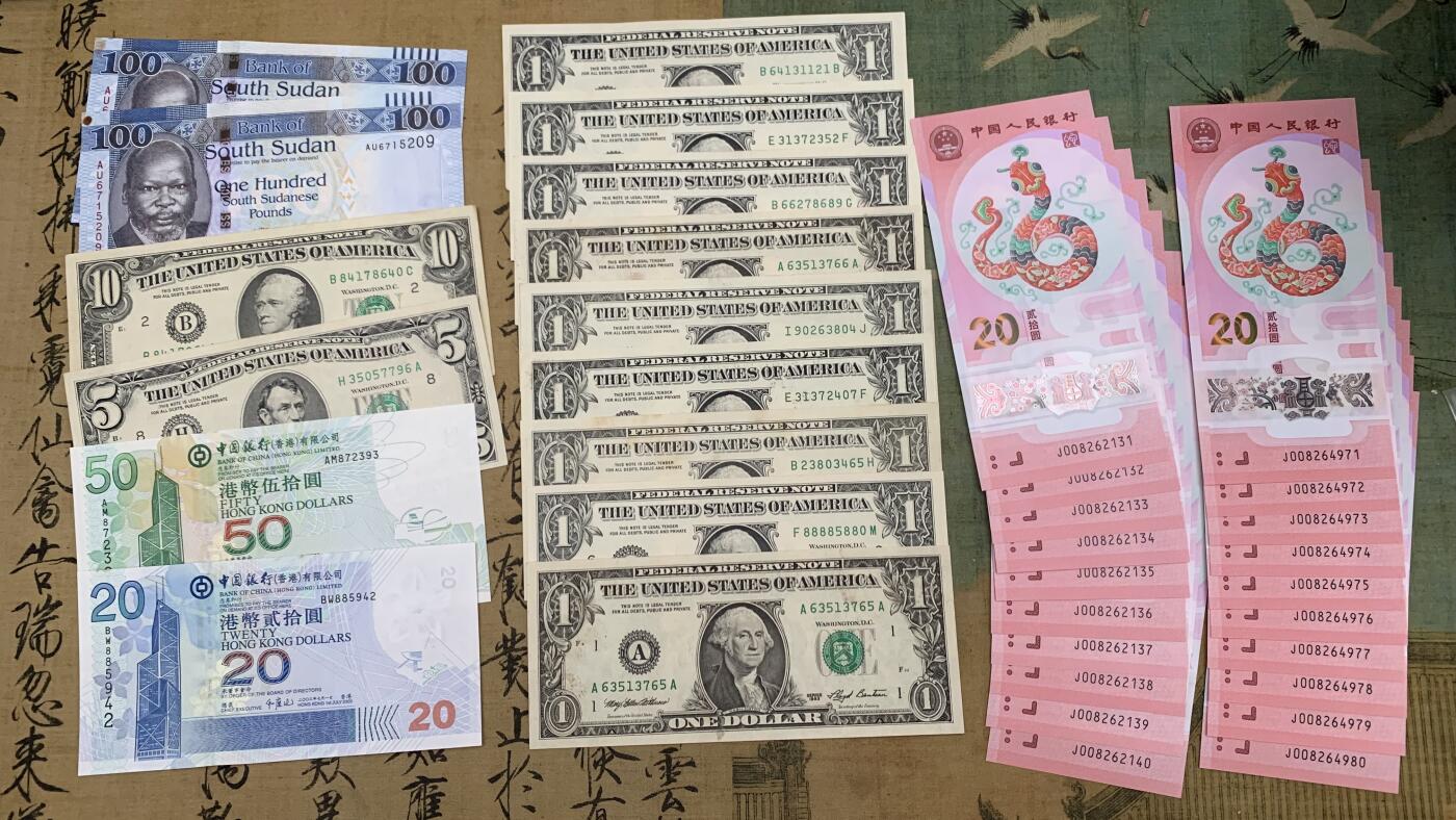 《竞宝斋》第461场 周日，周一，2场连拍 （全场包邮）欢迎送拍 蛇年纸币十连20张一组+24美元+70港币+200南苏丹 细节见图