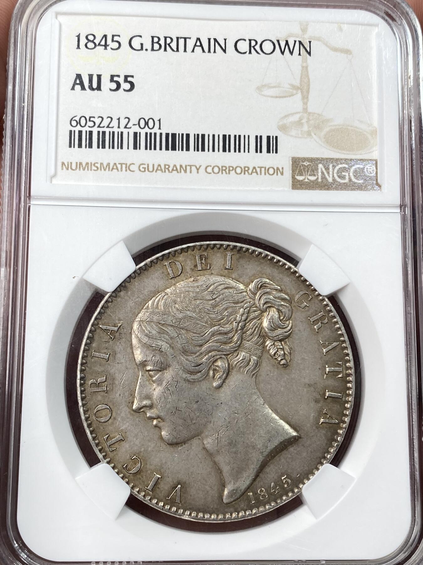 万国钱币拍卖第059期 NGC AU55 1845英国维多利亚女王盾徽克朗 英系克朗名誉品种 维多利亚流通克朗中的大难点 经典小维青年头像 原味淡彩好状态