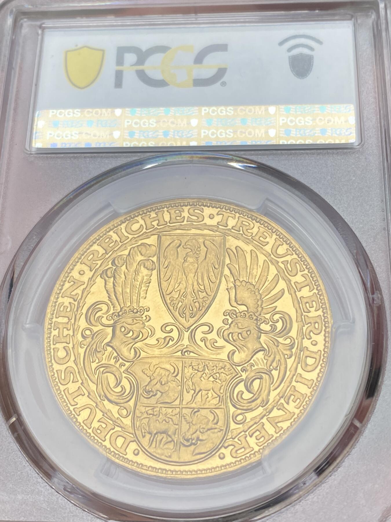 万国钱币拍卖第059期 PCGS SP63 1927年德国魏玛共和国兴登堡总统80大寿5马克金质币章 卡尔哥茨经典设计黄金化后异常诱人 其镜子般的深度镜面令人着迷 大尺寸金章无论何时均是人见人爱的品种 入手黄金的绝佳机会 22.87g 900金