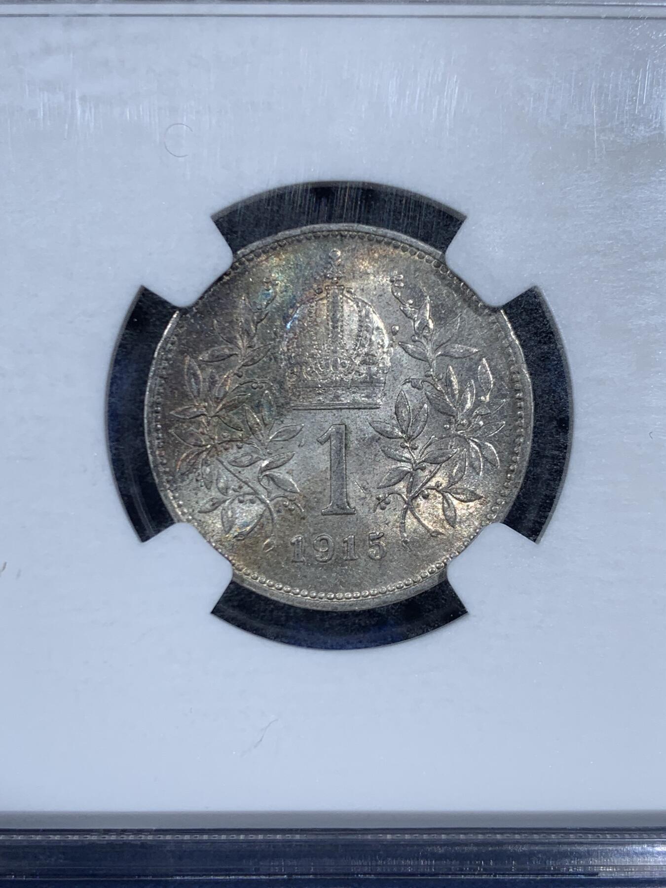 《竞宝斋》第461场 周日，周一，2场连拍 （全场包邮）欢迎送拍 NGC MS62 奥地利 奥匈帝国 1915年 1克朗银币 数字面清新的色阶五彩 盒子左边缘有磕