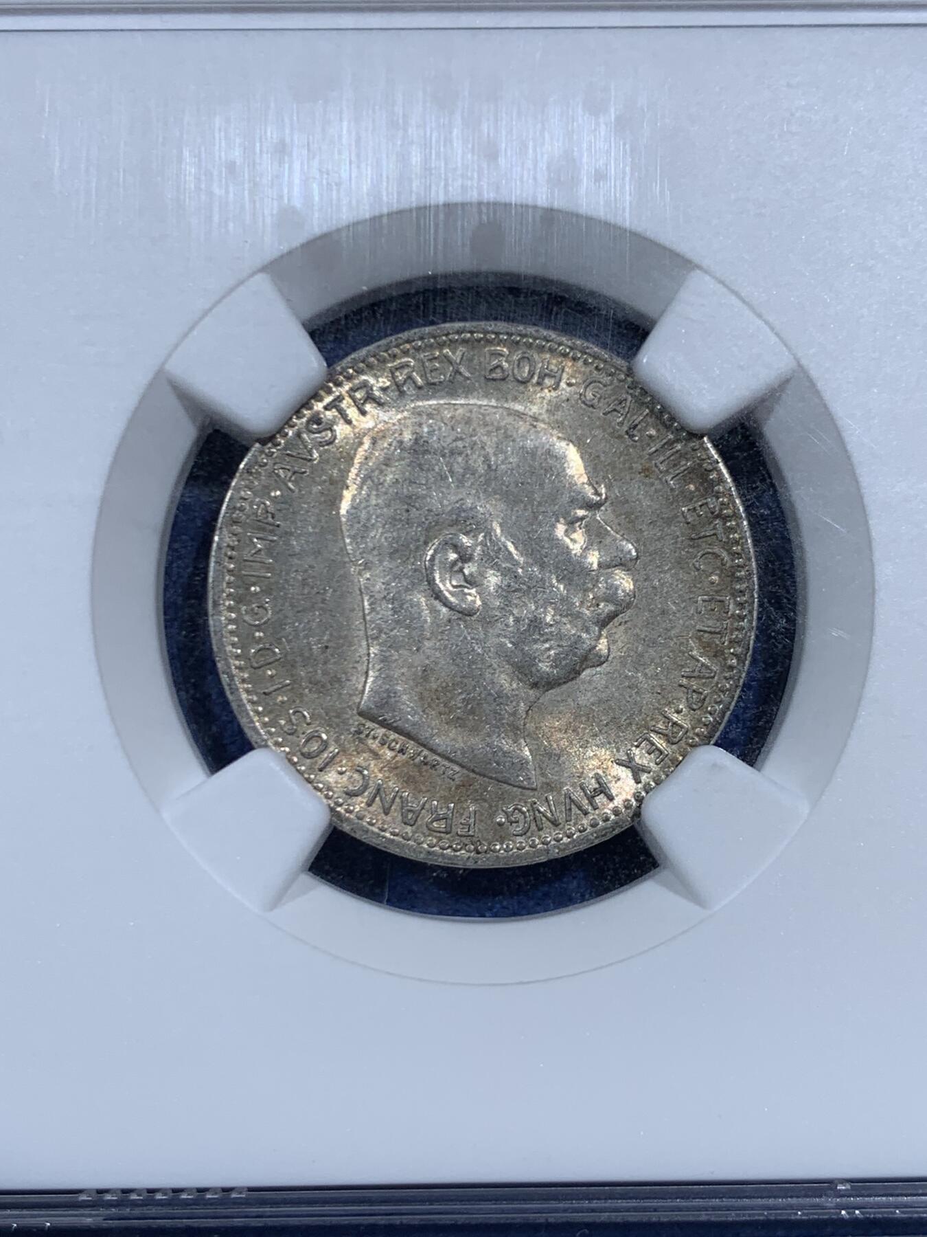 《竞宝斋》第461场 周日，周一，2场连拍 （全场包邮）欢迎送拍 NGC MS62 奥地利 奥匈帝国 1915年 1克朗银币 数字面清新的色阶五彩 盒子左边缘有磕