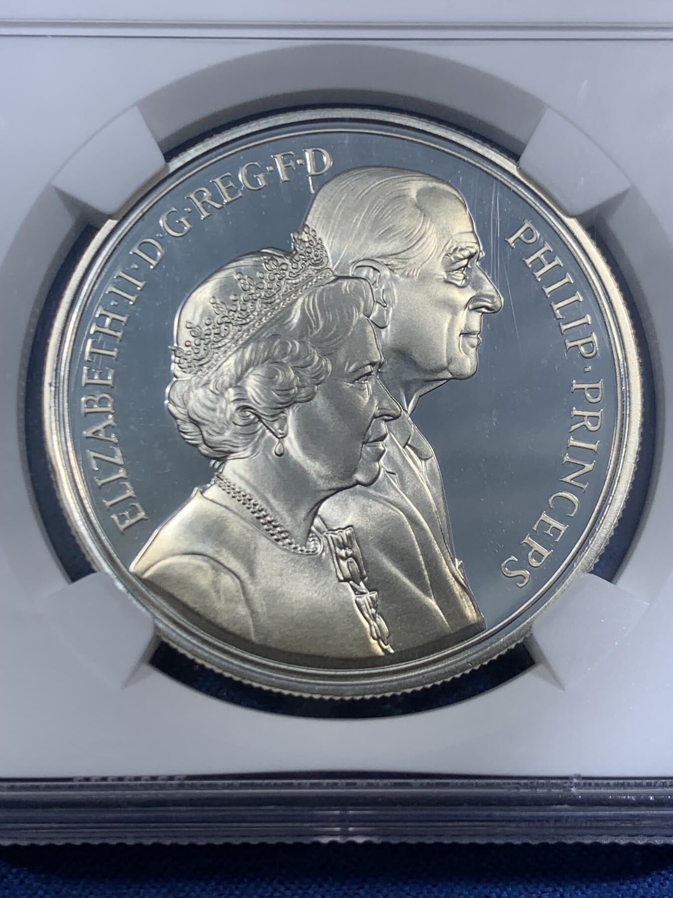 《竞宝斋》第461场 周日，周一，2场连拍 （全场包邮）欢迎送拍 NGC PF69UC 英国1997年伊丽莎白二世女王与菲利普亲王结婚50周年（金婚纪念日）5英镑精制银币 镜面浮雕 925银 28.25克