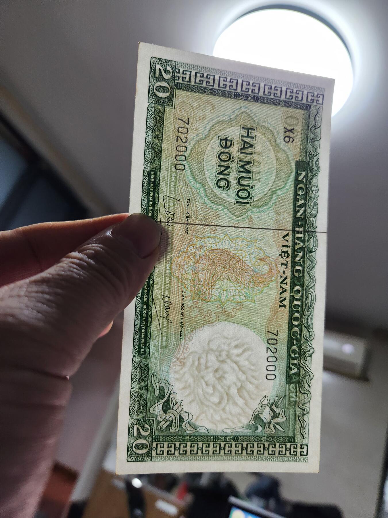 1月25号晚上8点 外国纸币自动截拍第13场 702000越南豹子号 新品