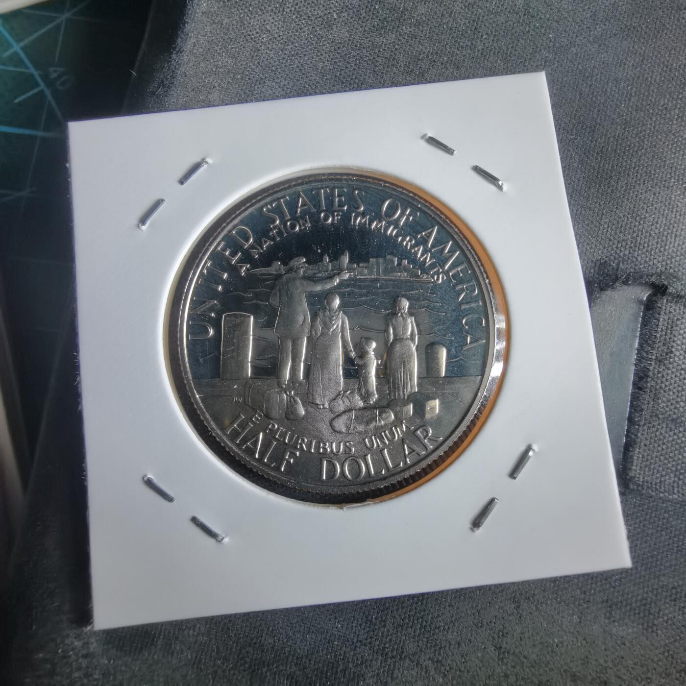 沼泽如烟--第974场 美国1986年50分精制币纪念币