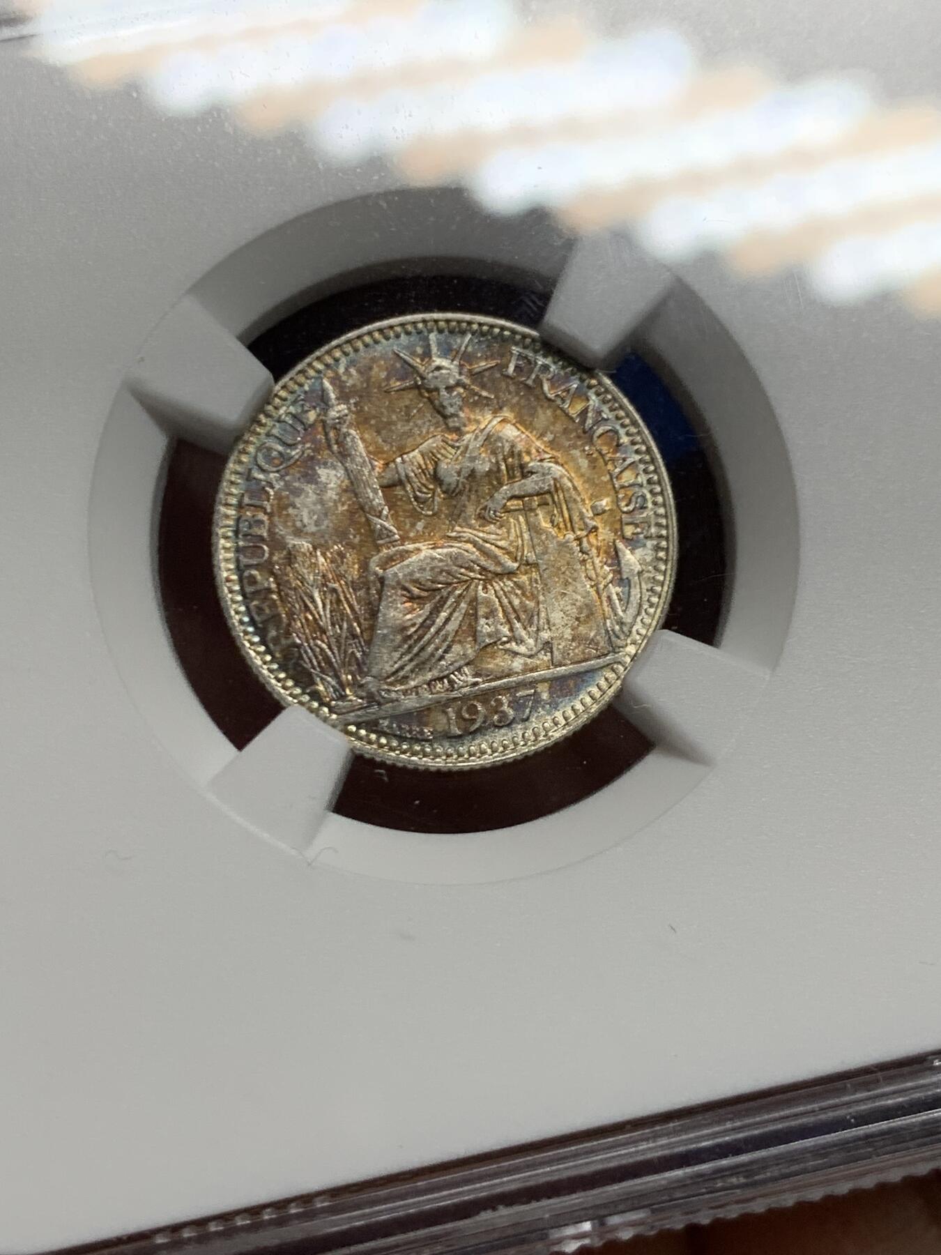 《竞宝斋》第461场 周日，周一，2场连拍 （全场包邮）欢迎送拍 NGC MS62 法属印支1937年坐洋10分银币，夺目绚丽五彩，分数虽然一般但彩可遇不可求