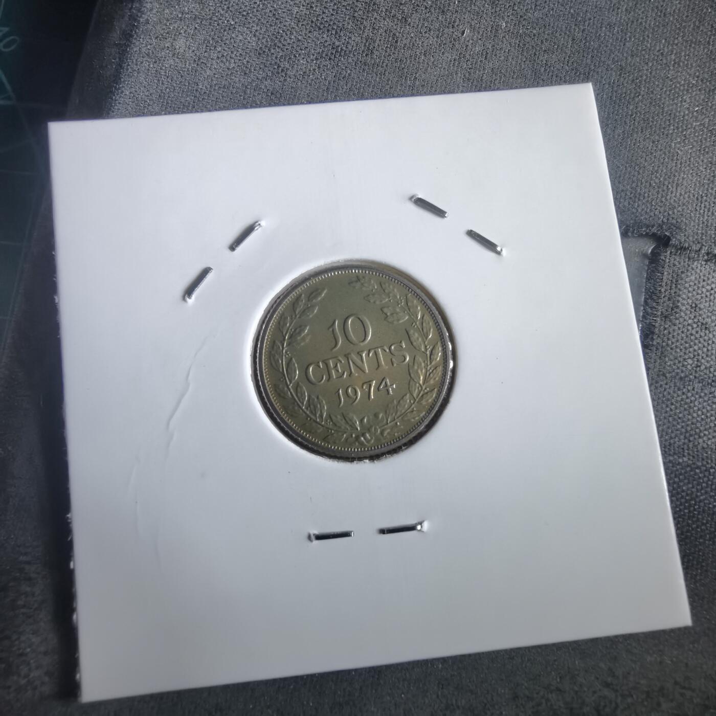 沼泽如烟--第974场 利比里亚10分精制币