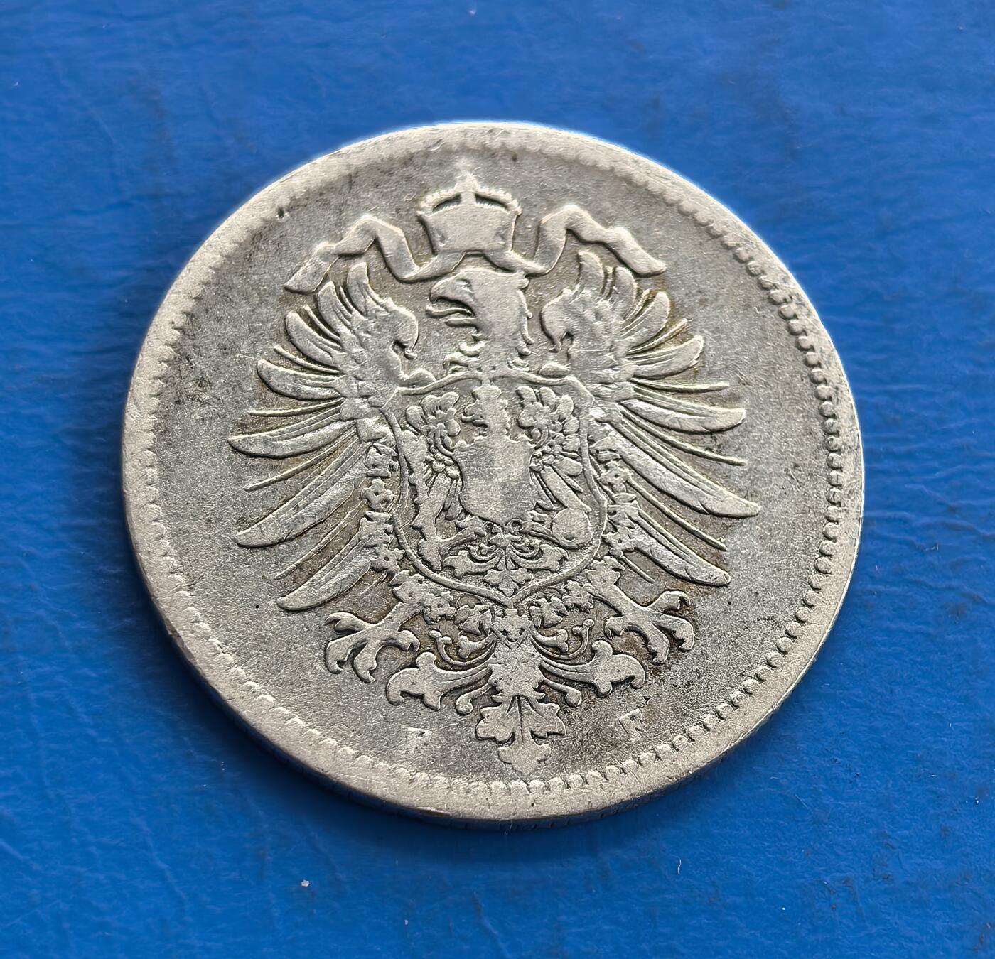外国优质老铜币高银银币，周六九点倒数截拍，满百包邮，持续收拍 1875 年德意志帝国1马克银币，正面以 “1 MARK” 为核心，橡叶花环环绕，象征国家稳固；背面是德意志帝国国徽双头鹰纹，细节繁复庄重，见证了德国统一初期的货币体系，兼具历史价值与工艺美感。